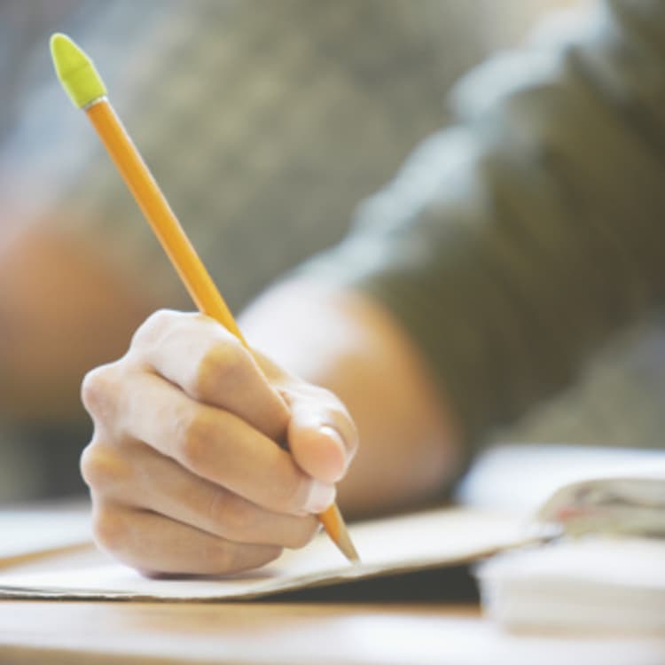 close-up-student-writing