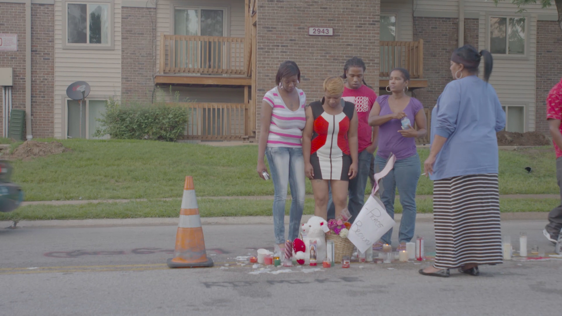 Michael Brown's mother visits the place where he was gunned down.