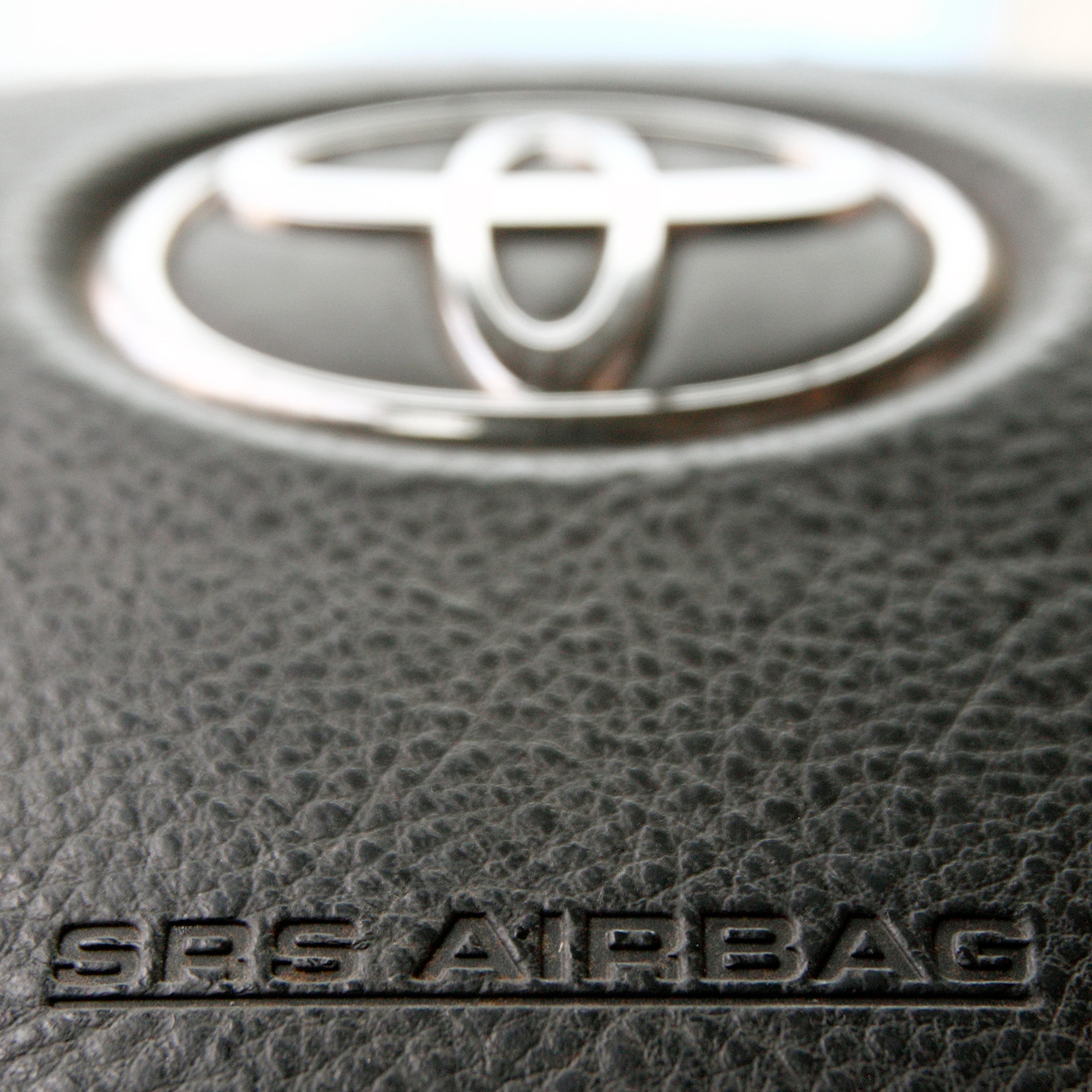 The steering wheel of a Toyota car which contains an airbag is pictured in Vienna