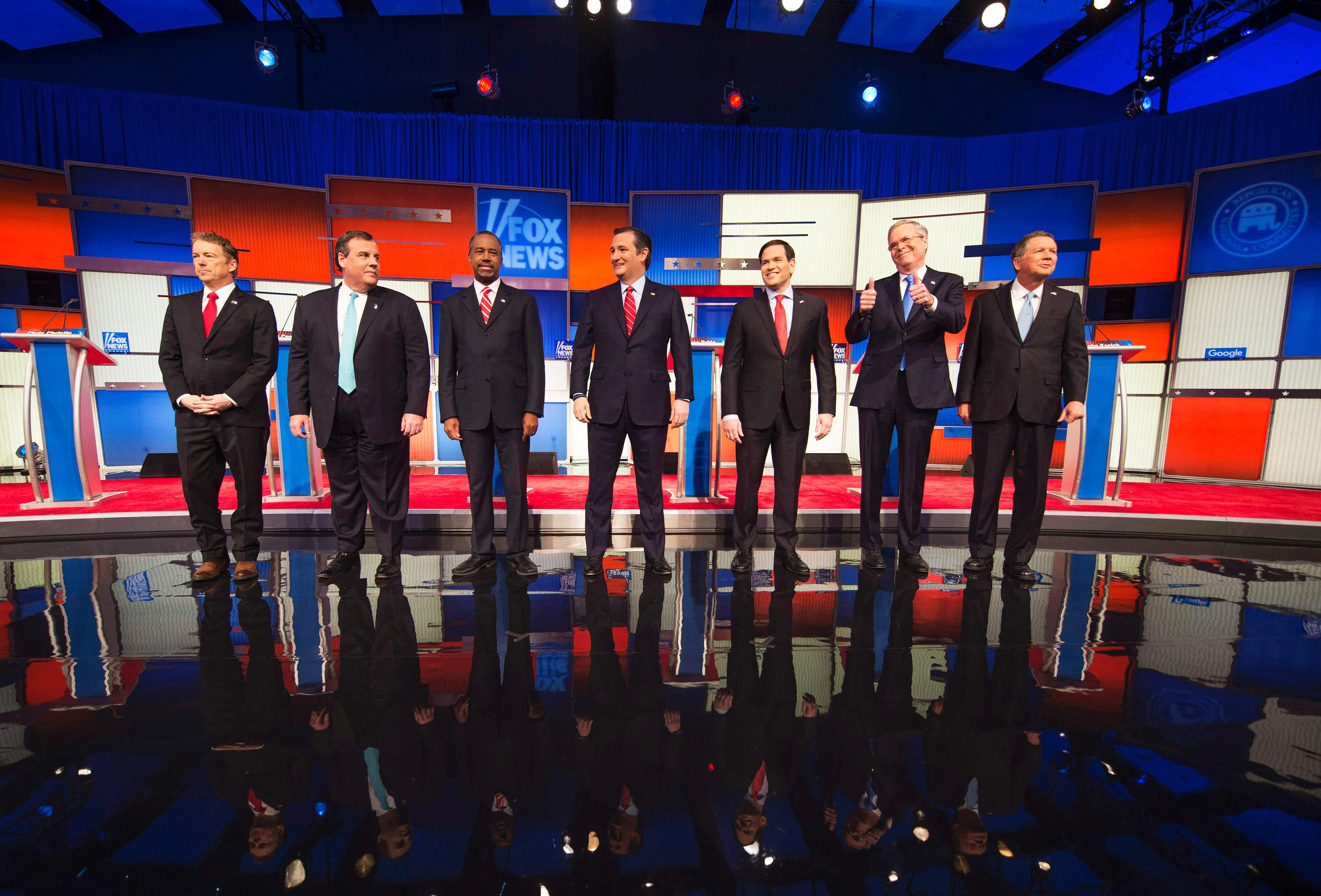 Republican presidential candidates, from left, Sen. Rand Paul, New Jersey Gov. Chris Christie, retired neurosurgeon Ben Carson, Texas Sen. Ted Cruz, Florida Sen.Marco Rubio, former Florida Gov. Jeb Bush, and Ohio Gov. John Kasich at the Republican presid