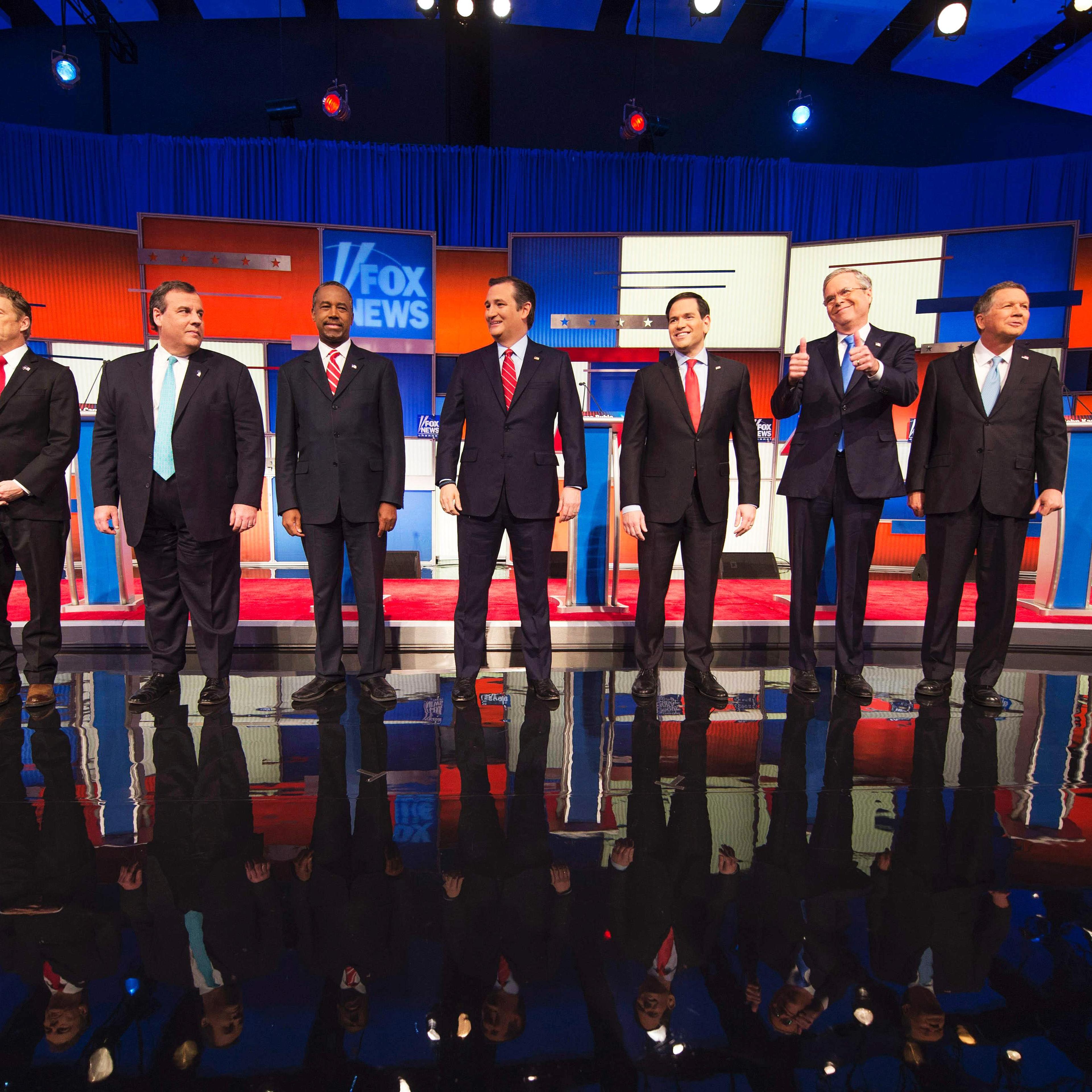 Republican presidential candidates, from left, Sen. Rand Paul, New Jersey Gov. Chris Christie, retired neurosurgeon Ben Carson, Texas Sen. Ted Cruz, Florida Sen.Marco Rubio, former Florida Gov. Jeb Bush, and Ohio Gov. John Kasich at the Republican presid
