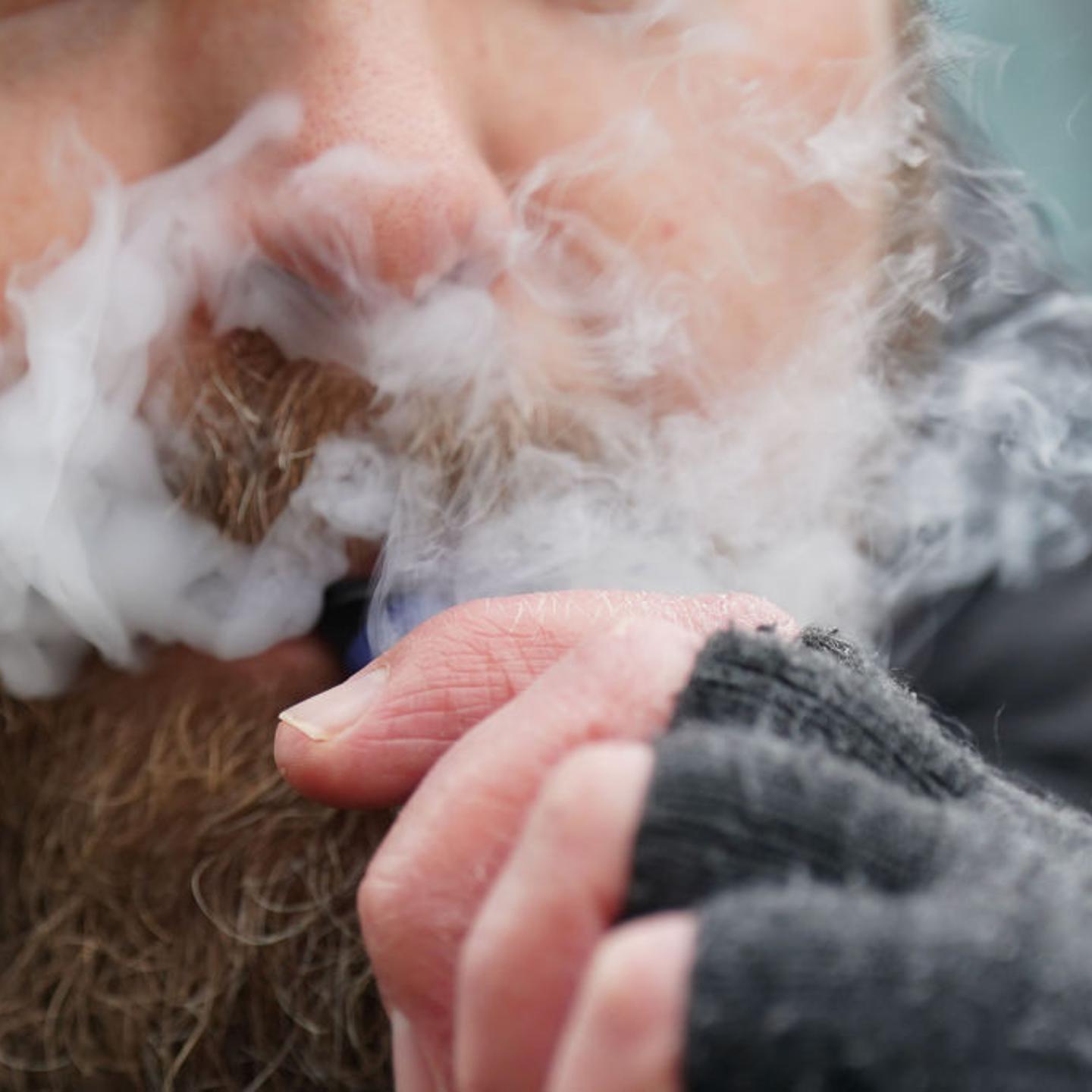 A man vaping.