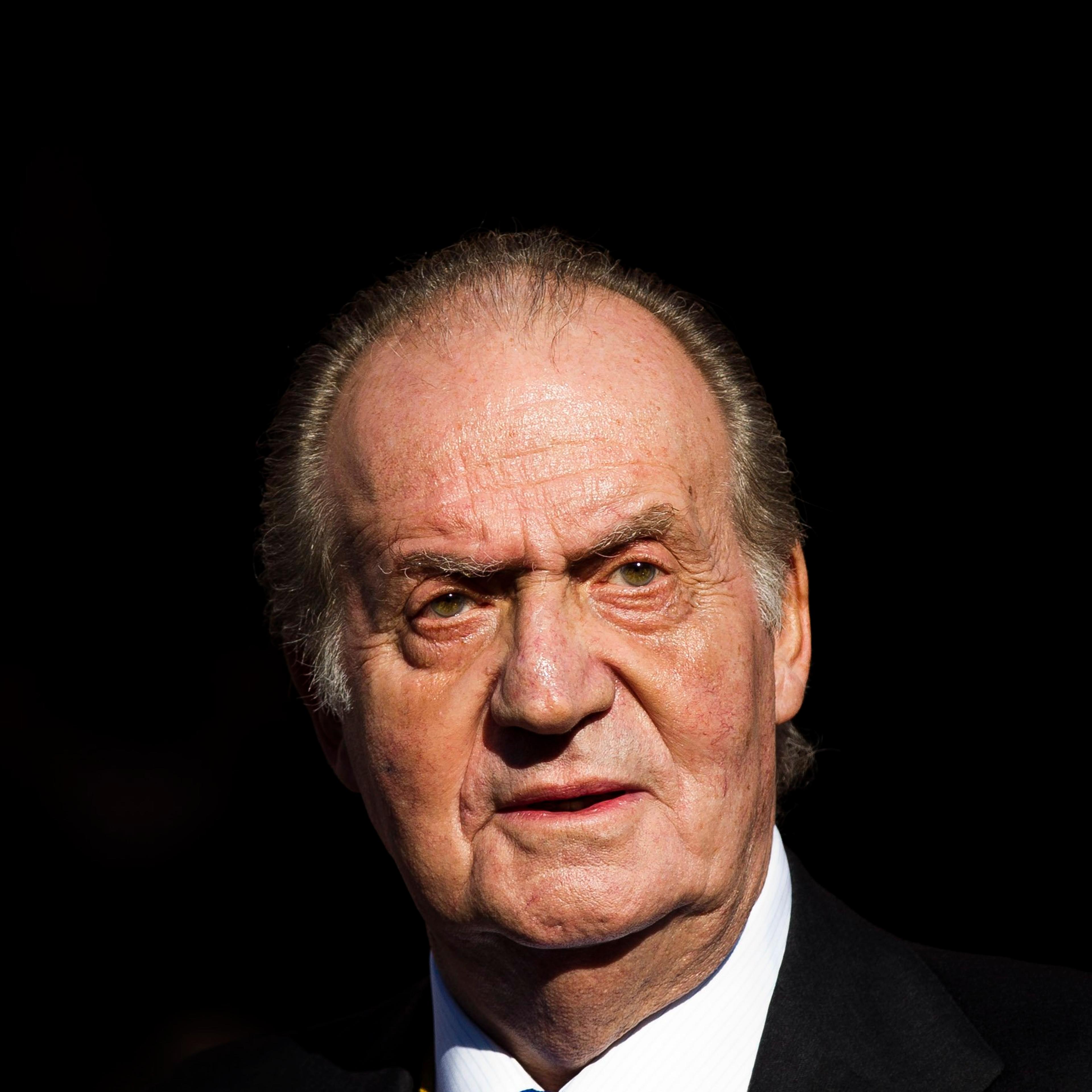 Spain's King Juan Carlos leaves after the official opening of the Parliament, in Madrid on Dec. 27, 2011.