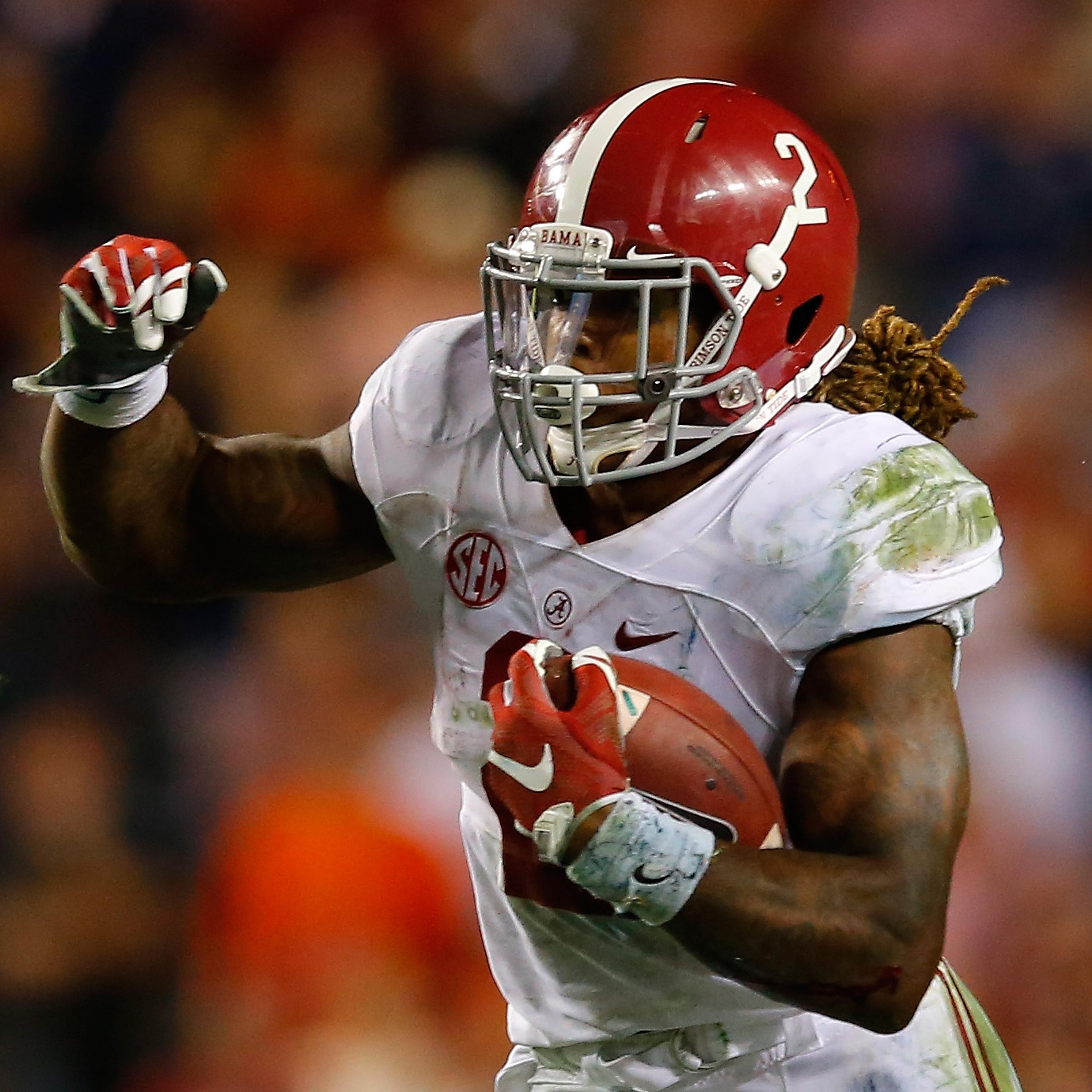 Derrick Henry #2 of the Alabama Crimson Tide rushes against the Auburn Tigers at Jordan Hare Stadium in Auburn, Alabama on Nov. 28, 2015.