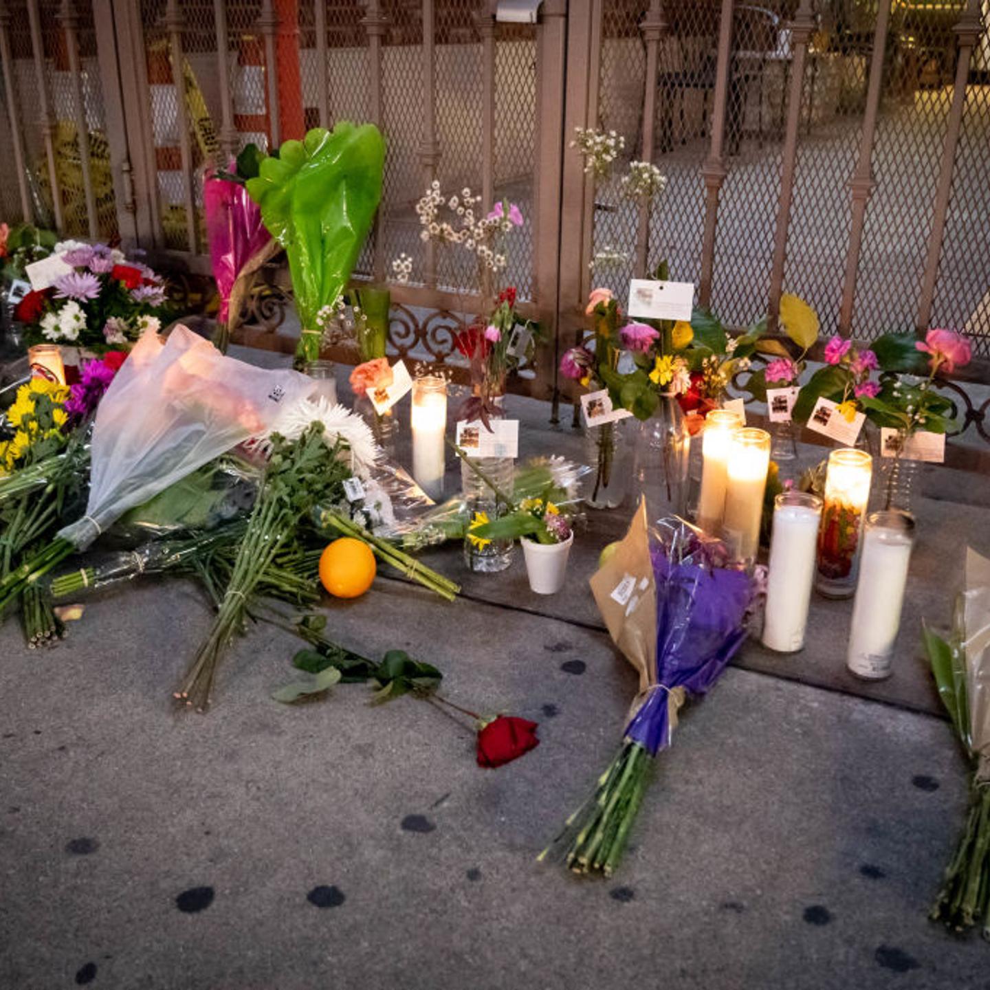 A memorial grows outside the Montery Park Dance Studio Shooting Site
