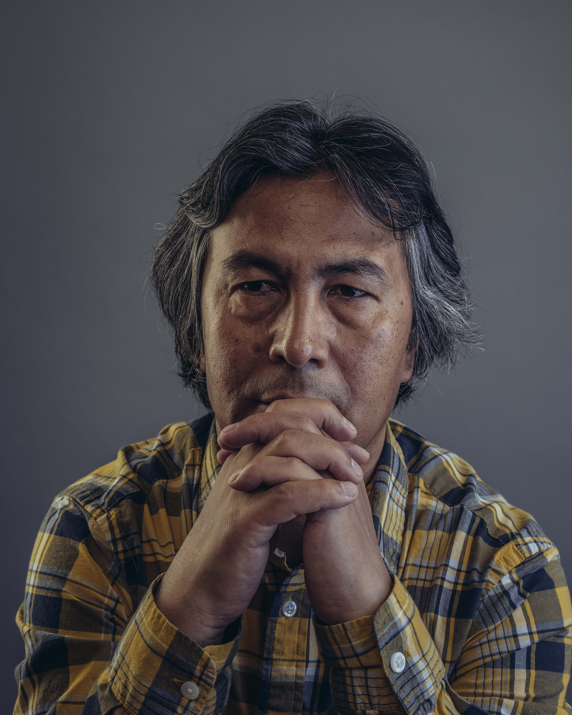 Uyghur poet Tahir Hamut Izgil at his home in Virginia on June 18, 2021. Izgil had to flee China with his family after it became clear that his family would be sent to an internment camp.