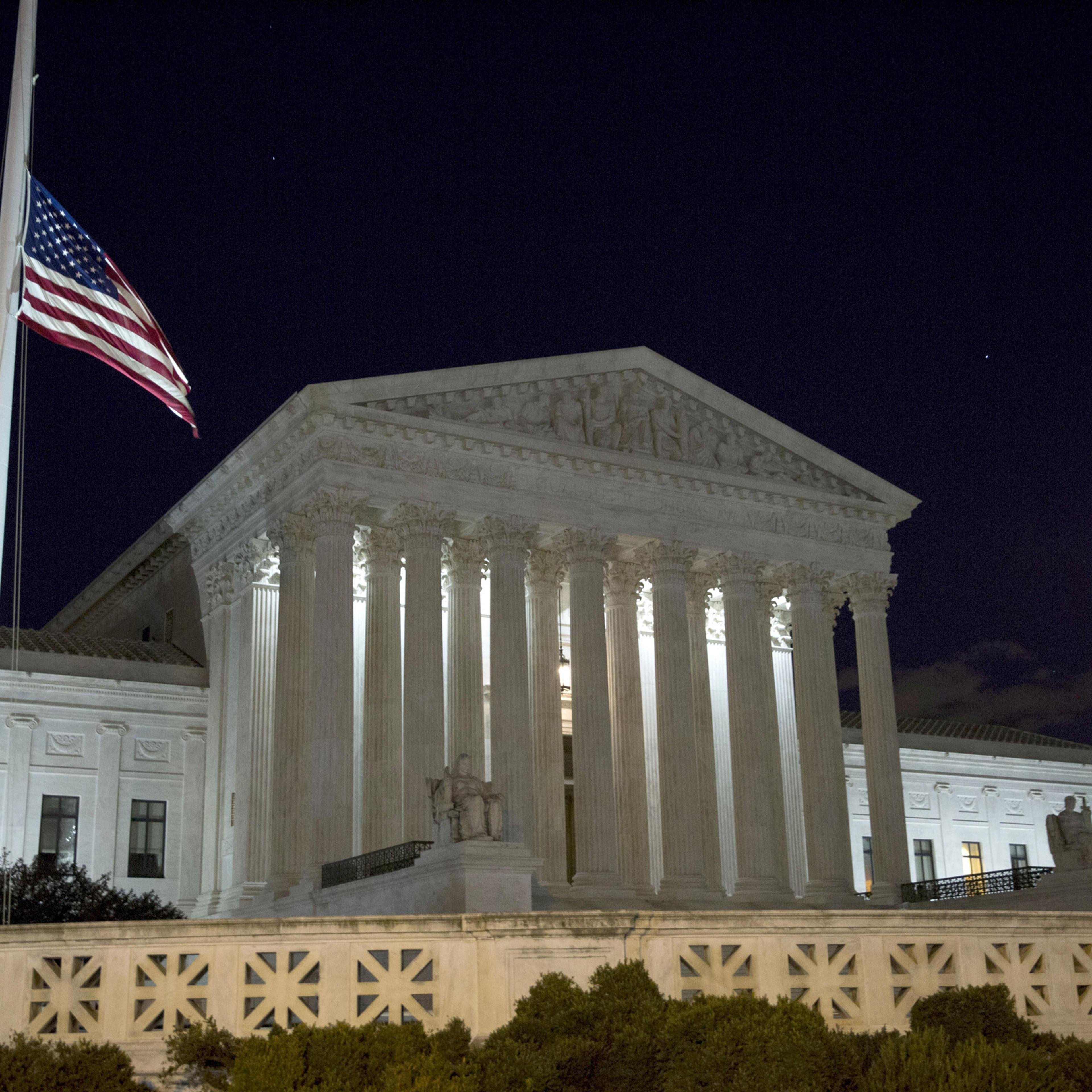 WASHINGTON, DC - FEBRUARY 13: The American flag flies at half mast at the U.S. Supreme Court February 13, 2016 in Washington, DC. Supreme Court Justice Antonin Scalia was at a Texas Ranch Saturday morning when he died at the age of 79. (Photo by Drew Ang