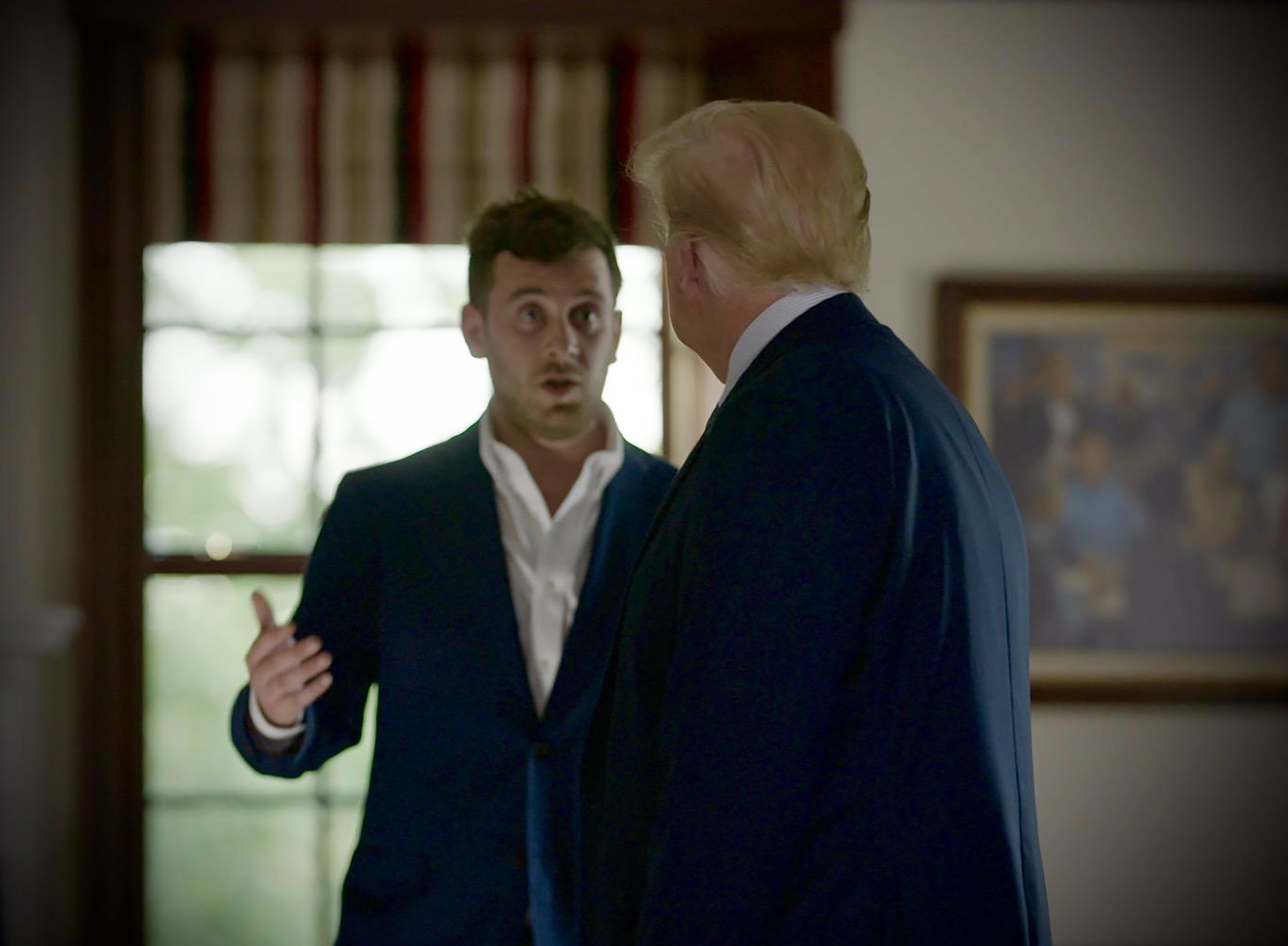 Alex Holder, left, with Donald Trump. All three parts of Holder's documentary on the Trumps will premiere on Discovery Plus on Sunday.