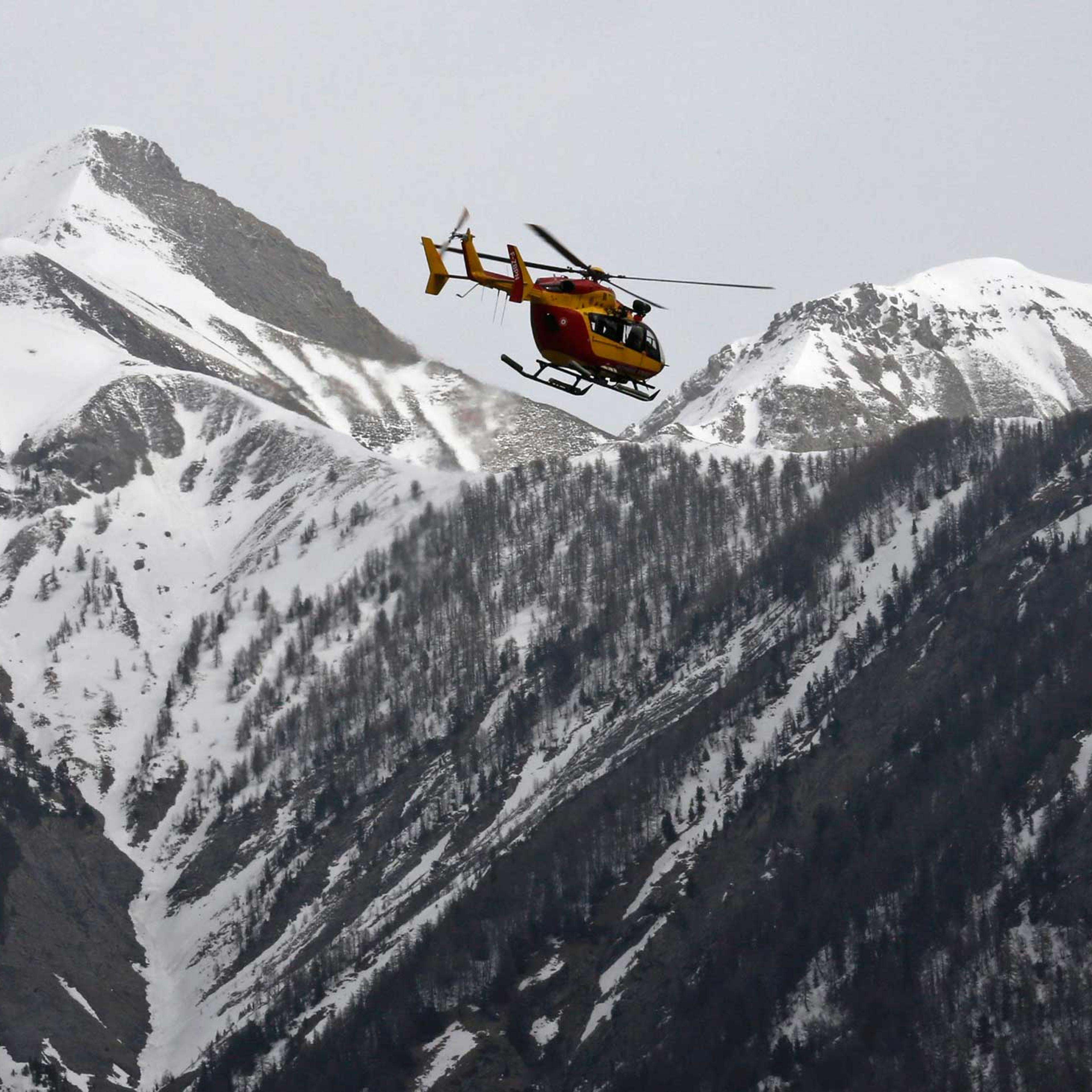 A rescue helicopter from the French Securite Civile flies over the French Alps during a rescue operation after the crash of an Airbus A320, near Seyne-les-Alpes, March 24, 2015.