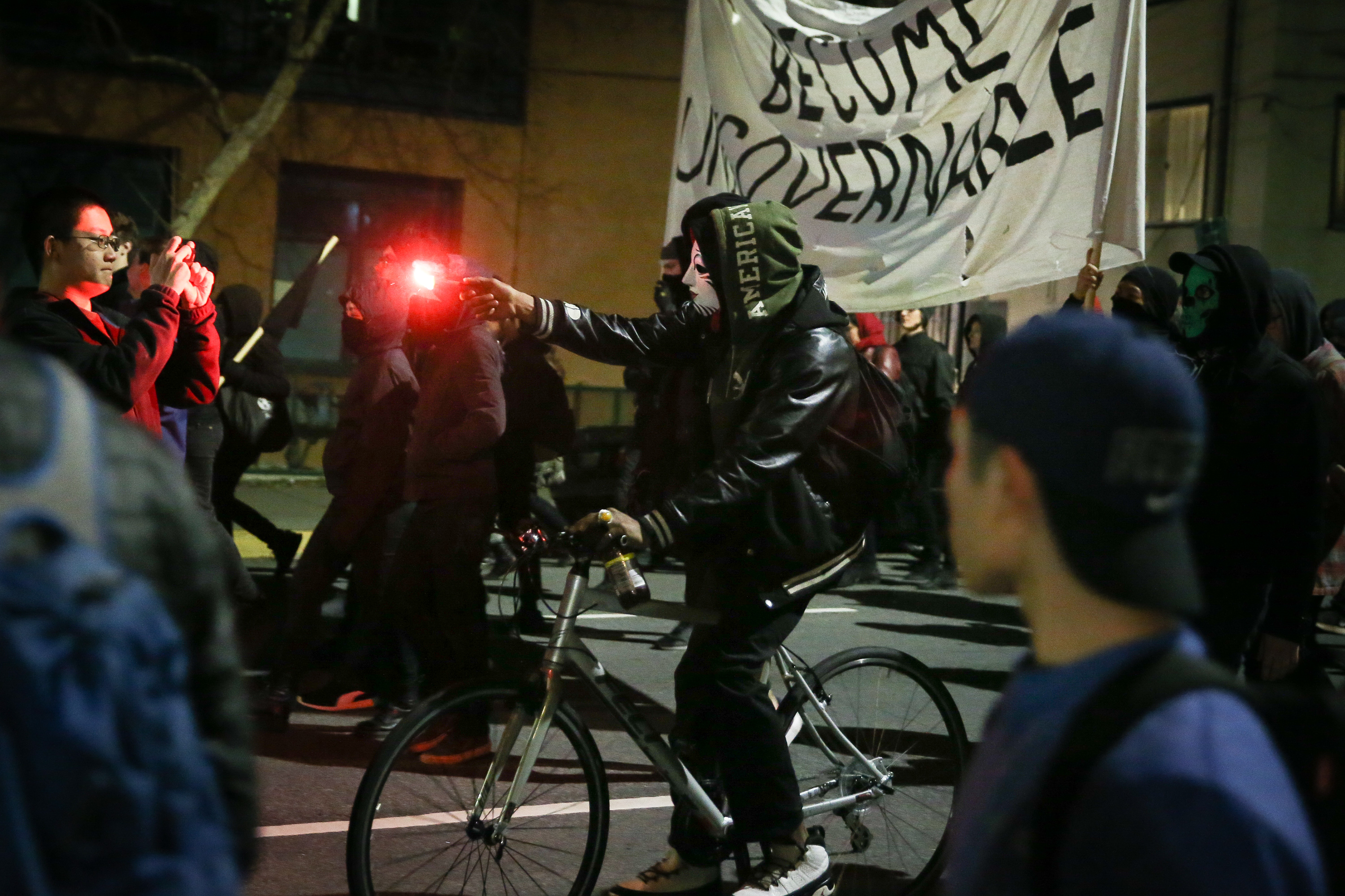 People protesting controversial Breitbart writer Milo Yiannopoulos march in the street in Berkeley, Calif., on Feb. 1, 2017.