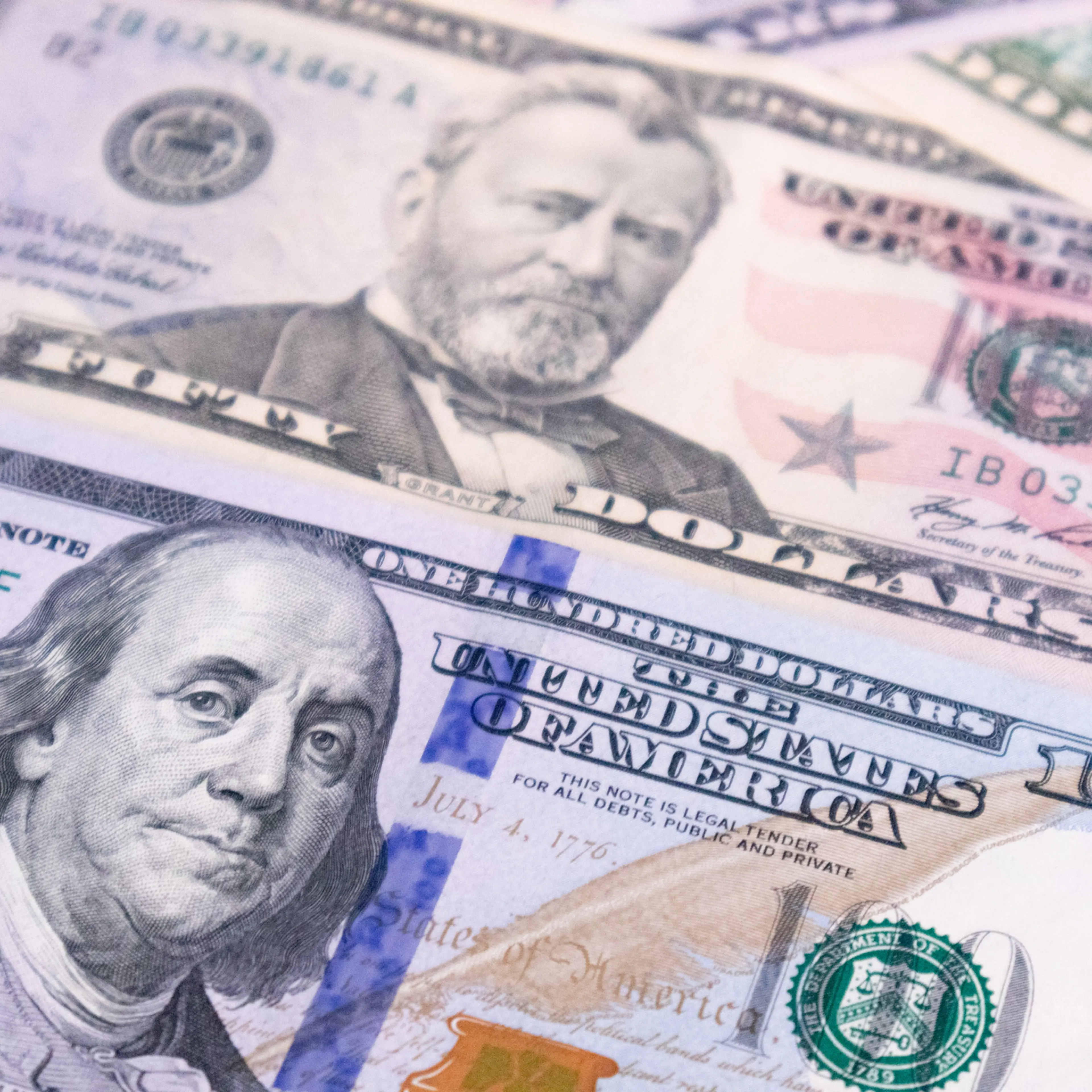 Money USA dollar banknotes for background.Money is any item or verifiable record that is generally accepted as payment for goods and services and repayment of debts