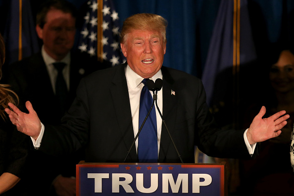 Supporters of Republican presidential candidate Donald Trump wait for results to come in on Primary day at his election night watch party at the Executive Court Banquet facility on February 9, 2016 in Manchester, New Hampshire.