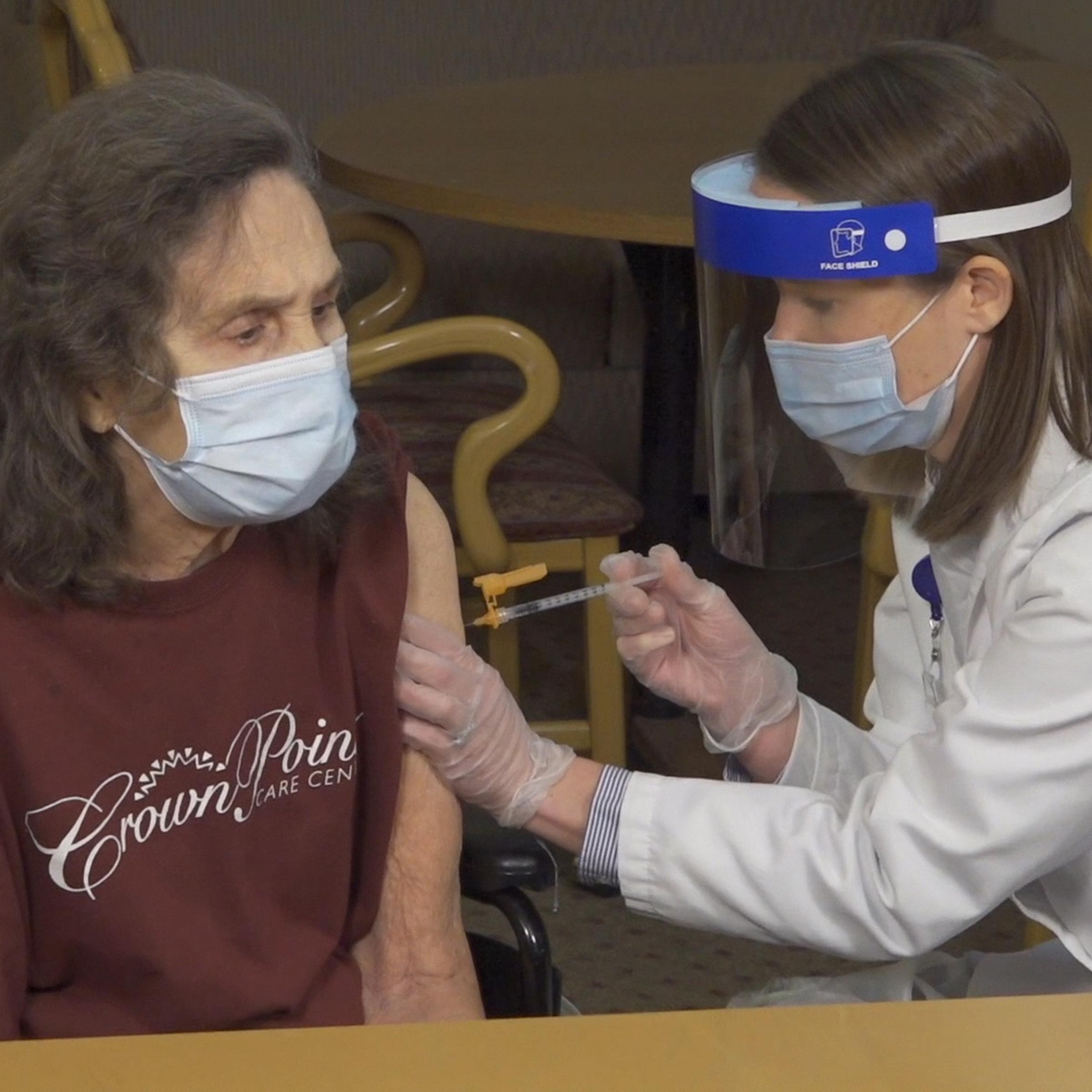 Rebecca Meeker gets vaccinated for COVID-19 on Dec. 18