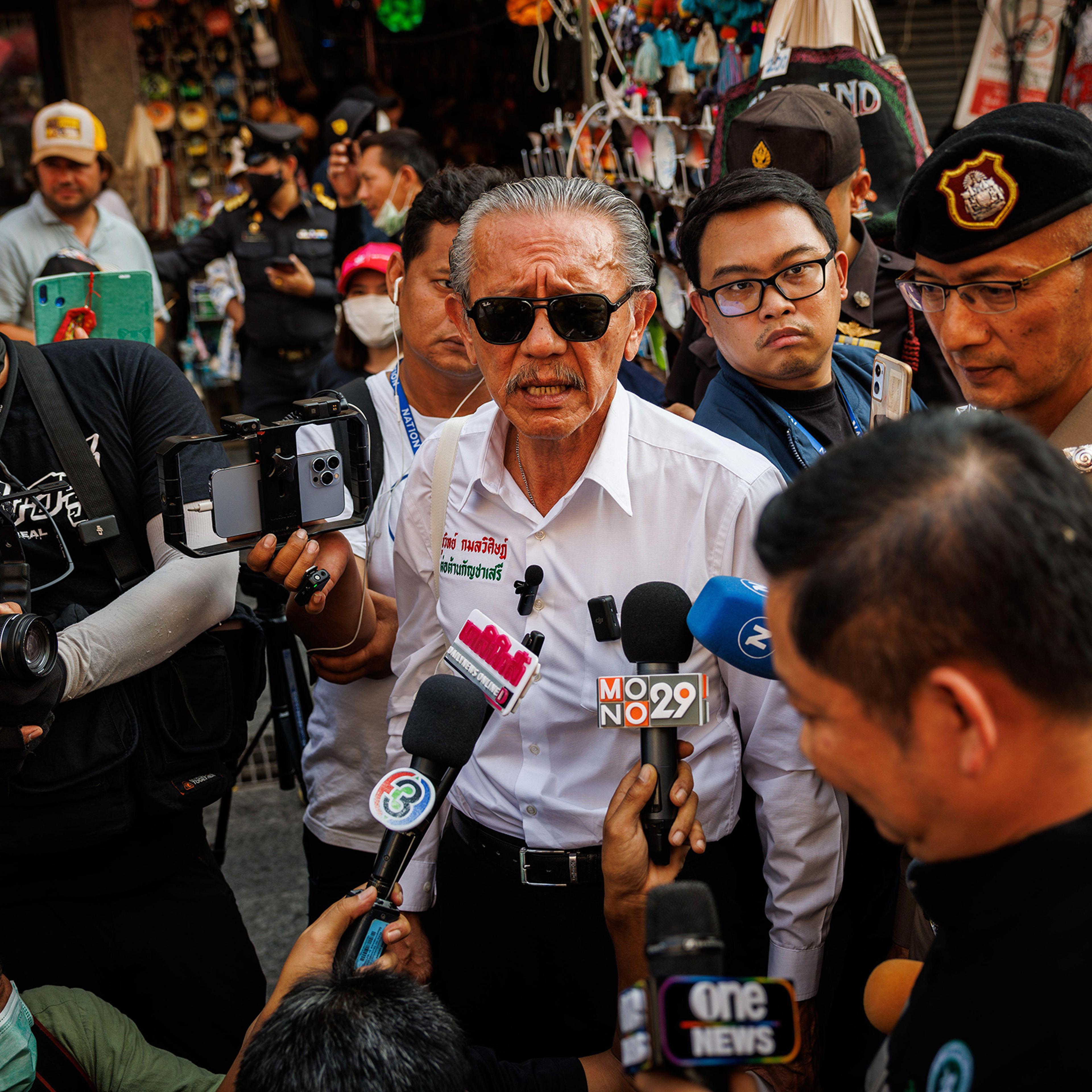Chuwit Kamolvisit, a self-styled whistleblower and controversial Thai politician, campaigns against marijuana on Khao San road in Bangkok, Thailand, on April 20, 2023.
