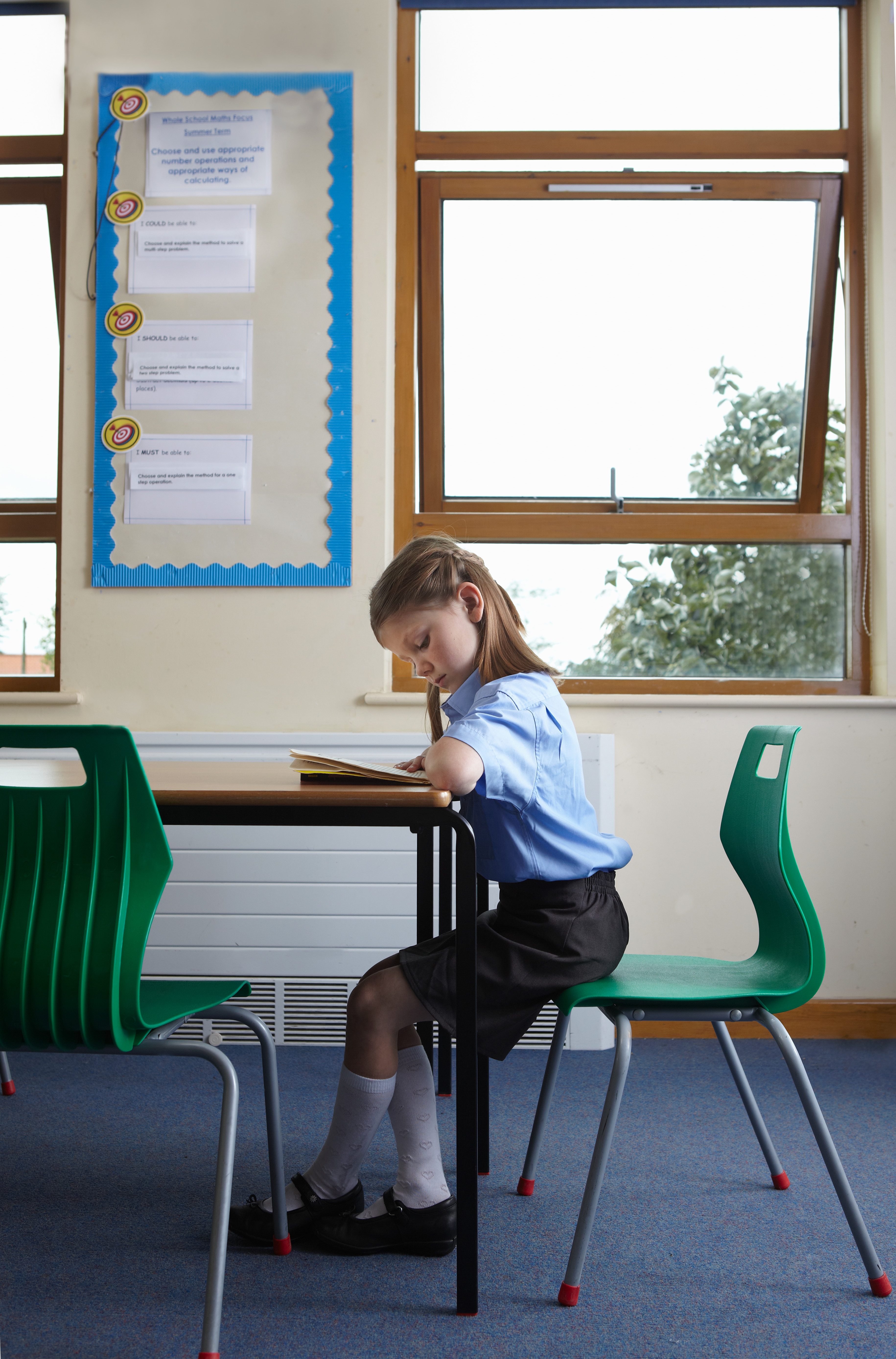 Girl learning to read