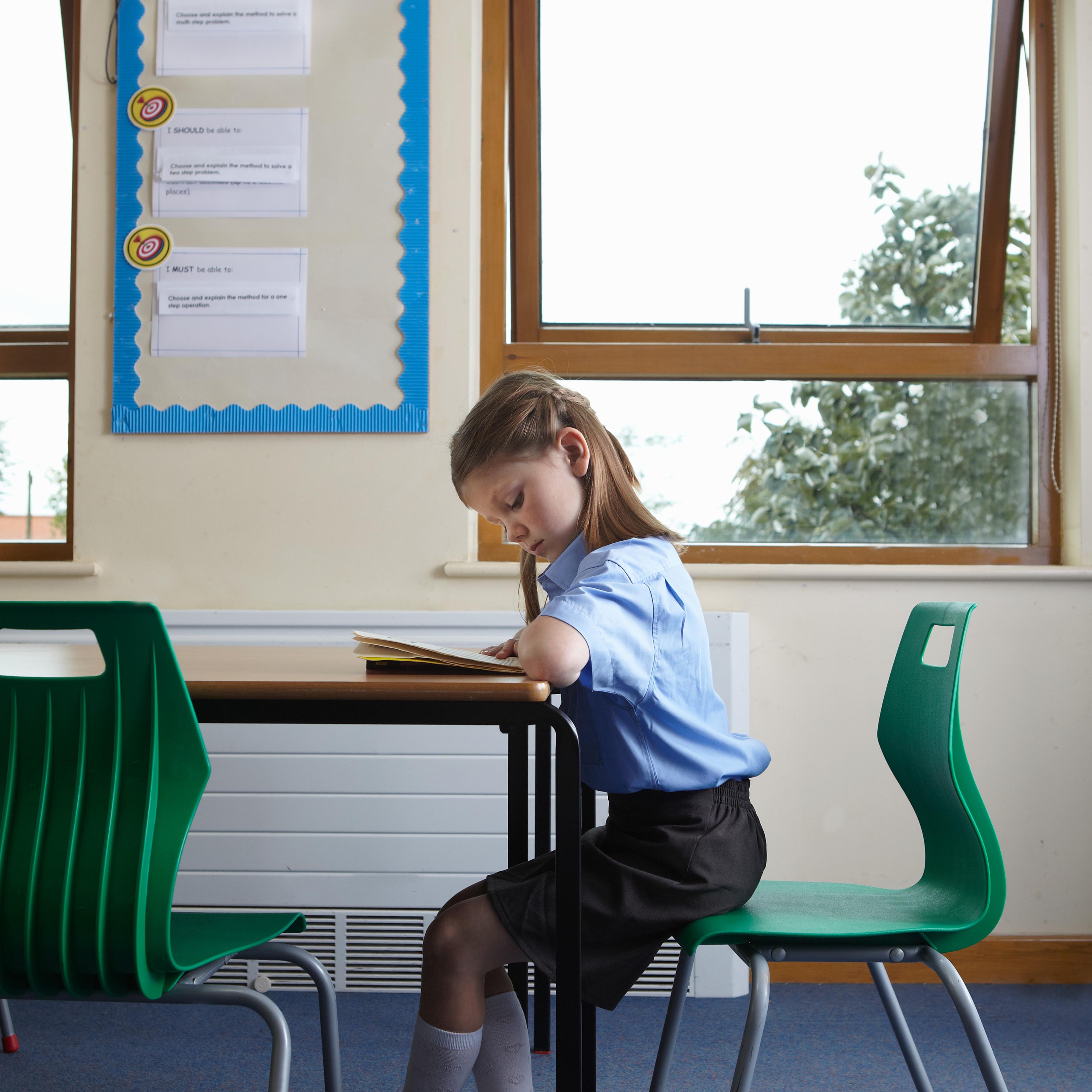 Girl learning to read