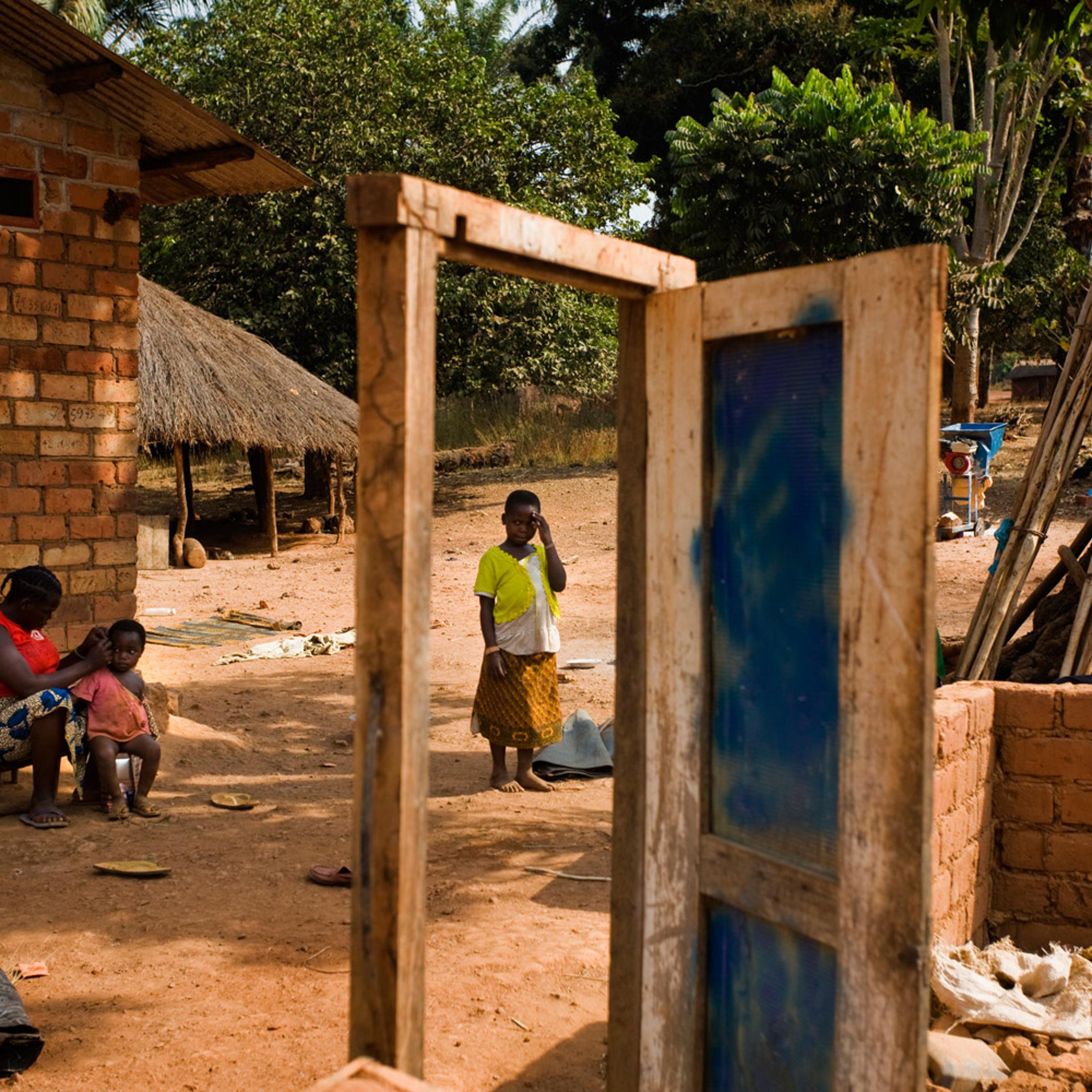 Jan. 27, 2012. Locals stand in the midst of new home construction.