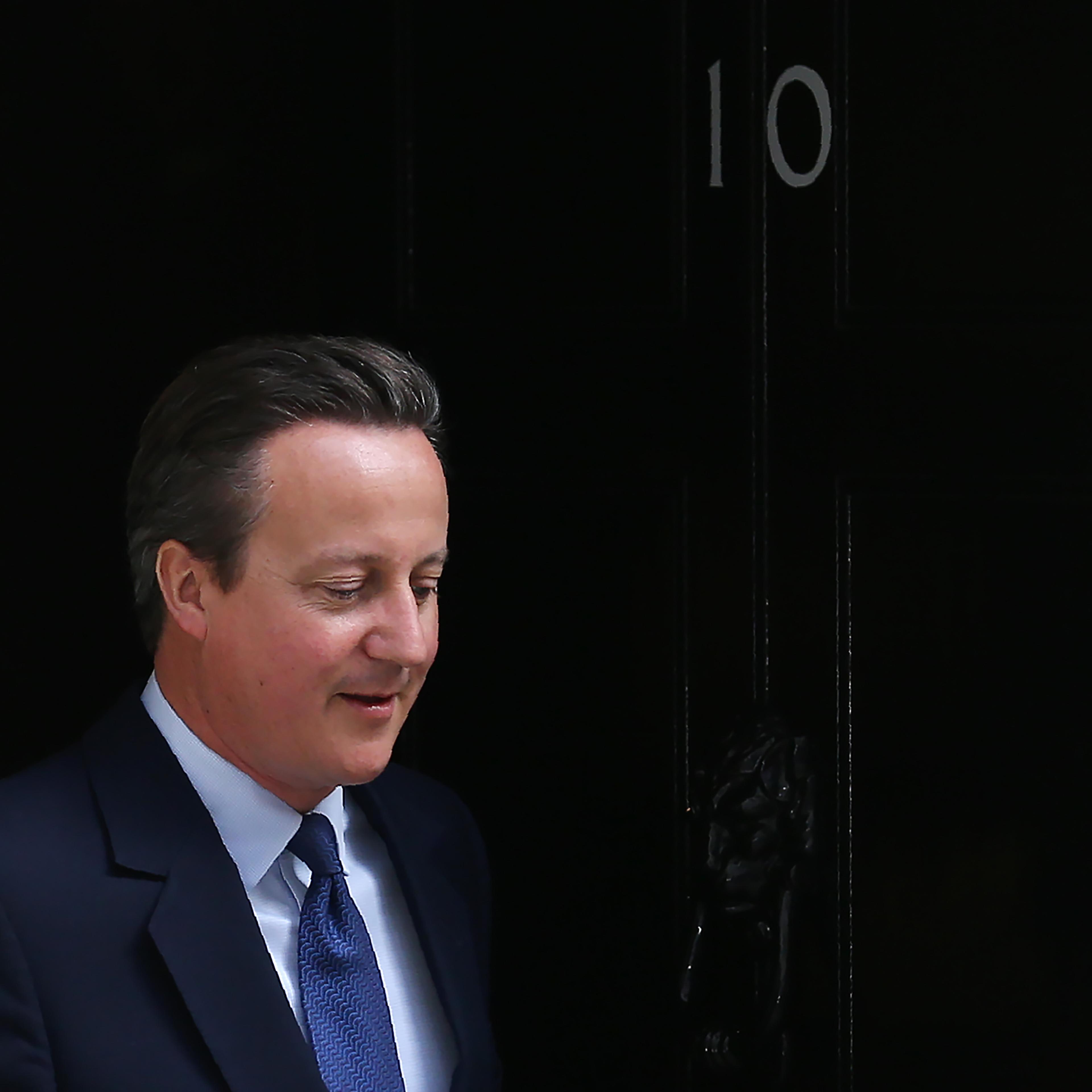 Britain's ougoing Prime Minister David Cameron leaves 10 Downing Street as he prepares to address his final Prime Minister's Question Time in the House of Commons in London on July 13, 2016.