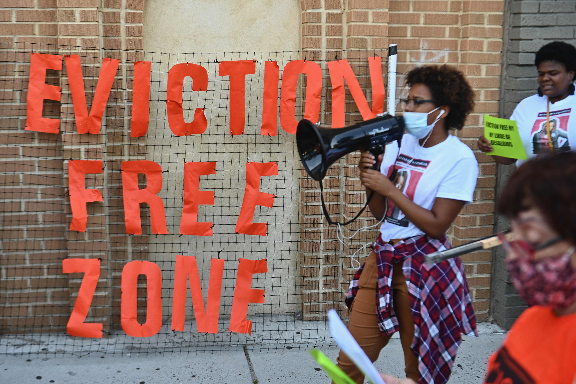 Community members protest against evictions and in support of the movement to "cancel rent" outside the Bronx housing court on August 10
