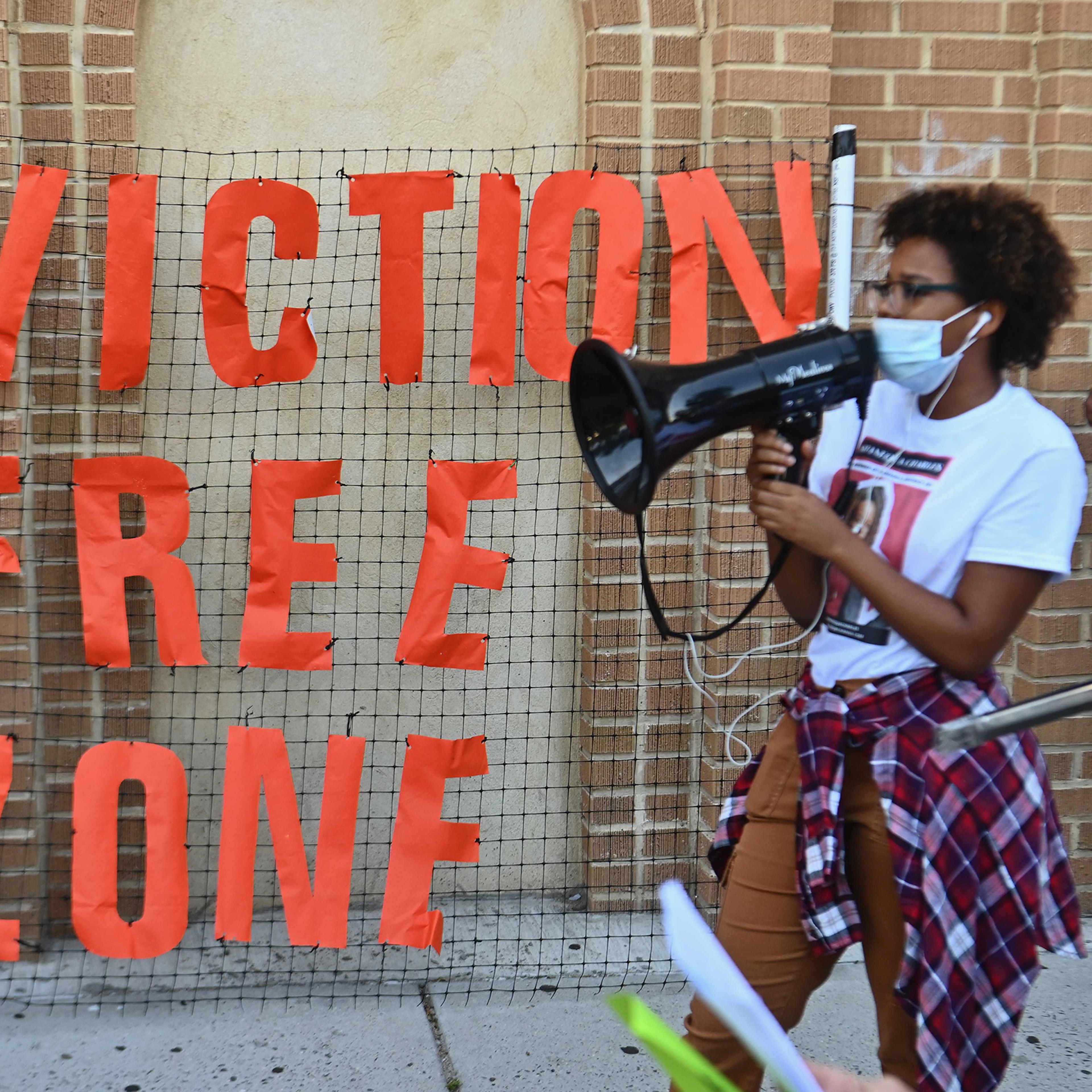 Community members protest against evictions and in support of the movement to "cancel rent" outside the Bronx housing court on August 10
