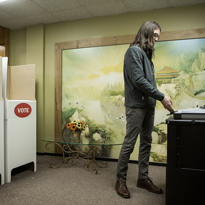 Scott Stuckey of Oklahoma City feeds a ballot into an optical scanner at Trinity Baptist Church on Super Tuesday March 1, 2016 in Oklahoma City. Oklahoma voters head to the polls for the 2016 Presidential Primary.