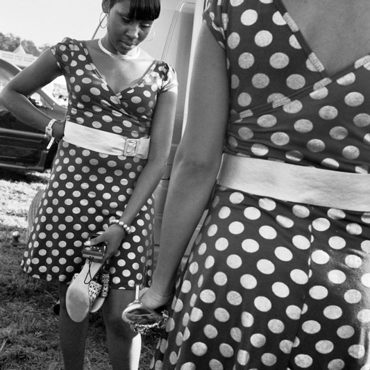 Singers in polka dot dresses attend the Greenville Blues Festival, the second oldest continuously operating blues festival in the United States held in Greenville, Miss.