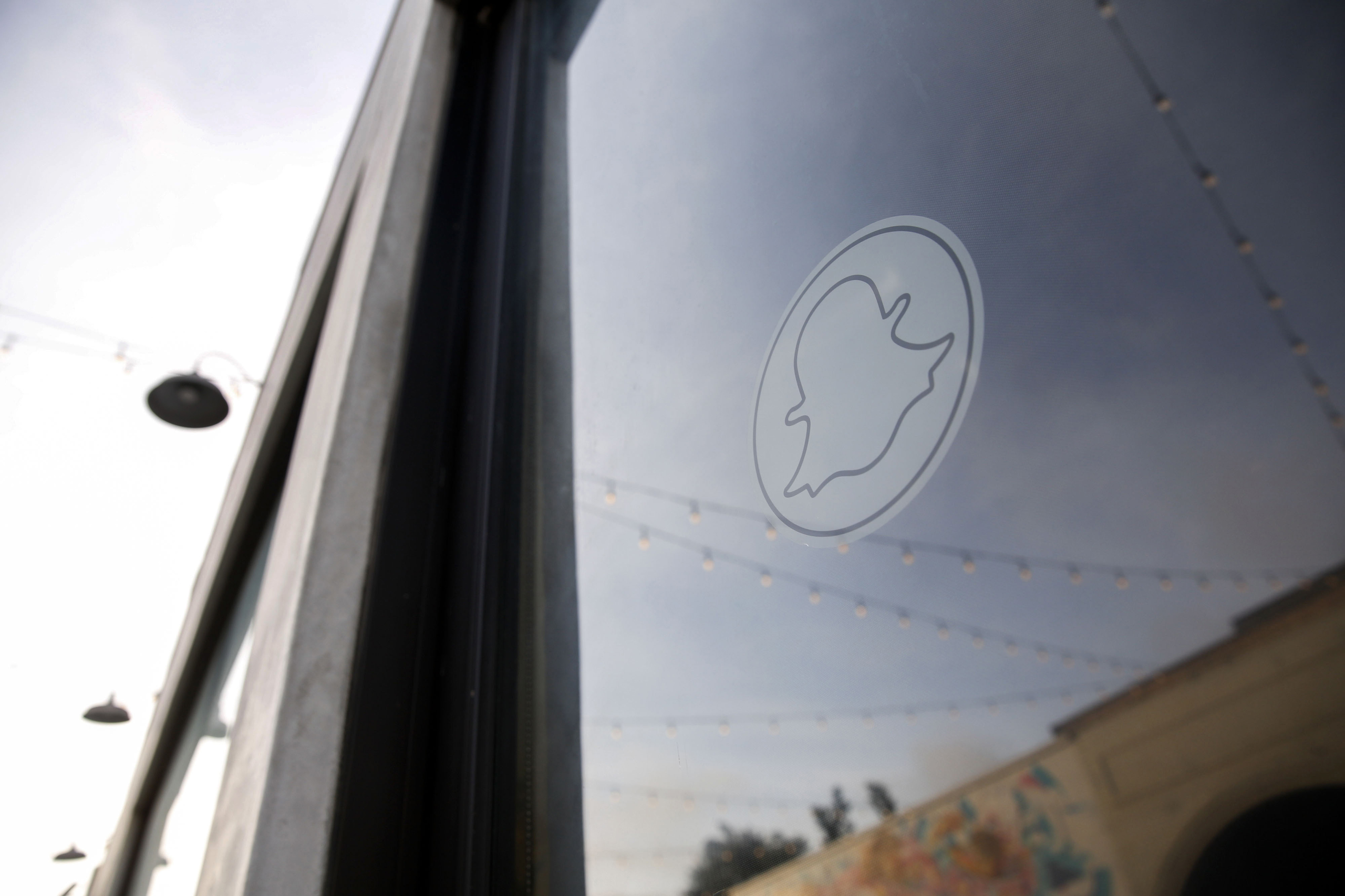 The Snapchat Inc. logo is displayed on the door of the company's headquarters in the Venice Beach neighborhood of Los Angeles, March 2, 2016.