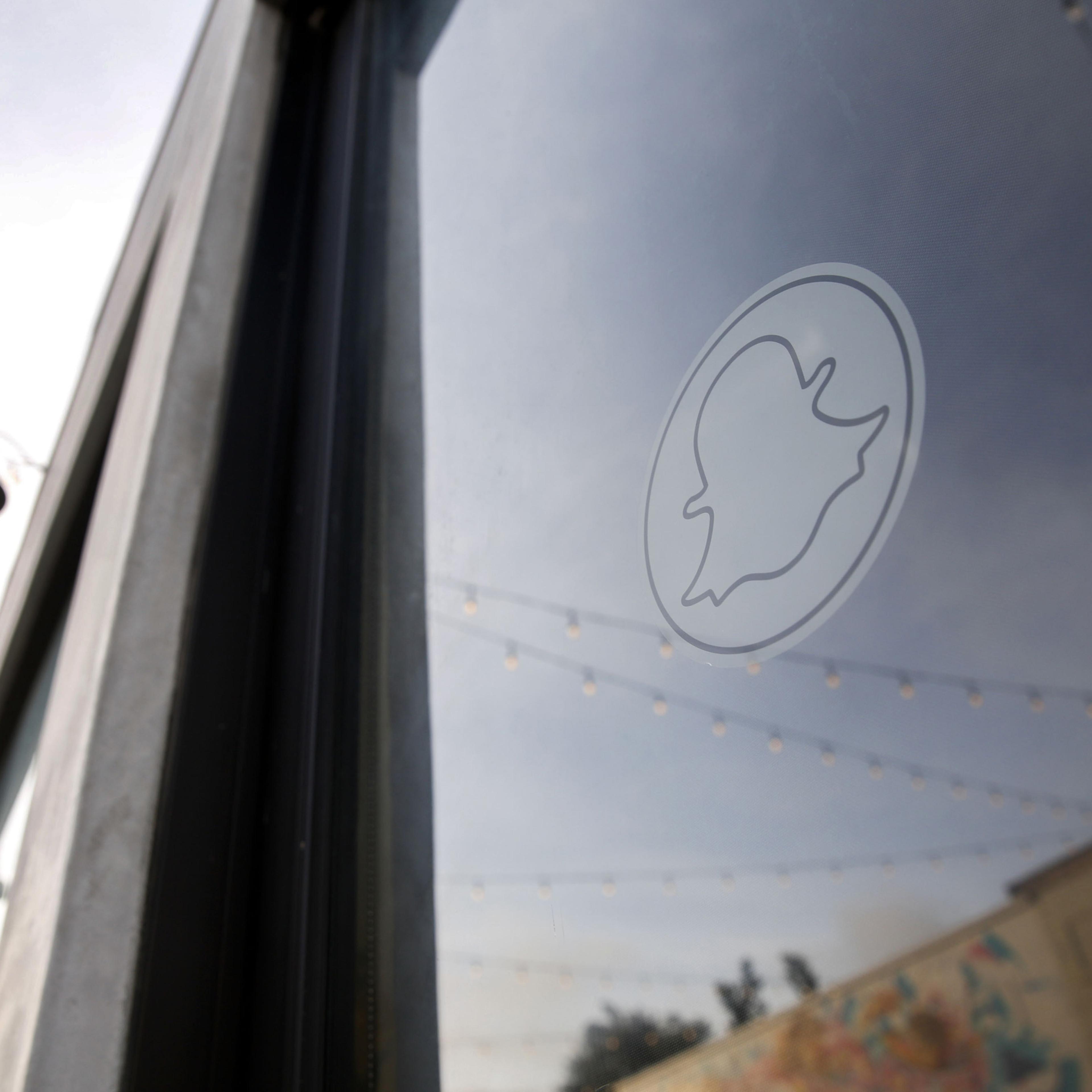 The Snapchat Inc. logo is displayed on the door of the company's headquarters in the Venice Beach neighborhood of Los Angeles, March 2, 2016.