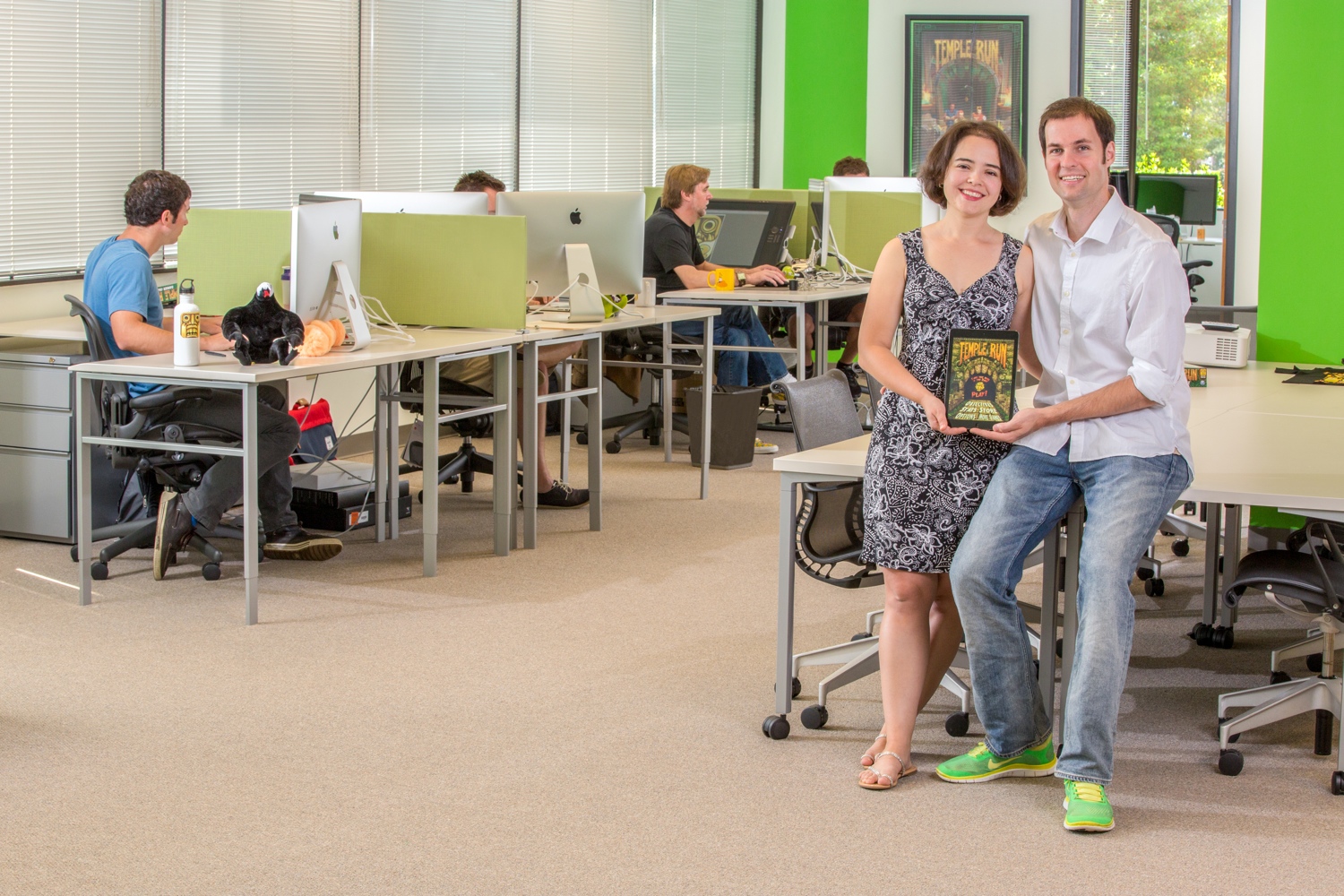 Imangi Studios co-founders  Keith Shepherd and Natalia Luckyanova pose in a company photo.