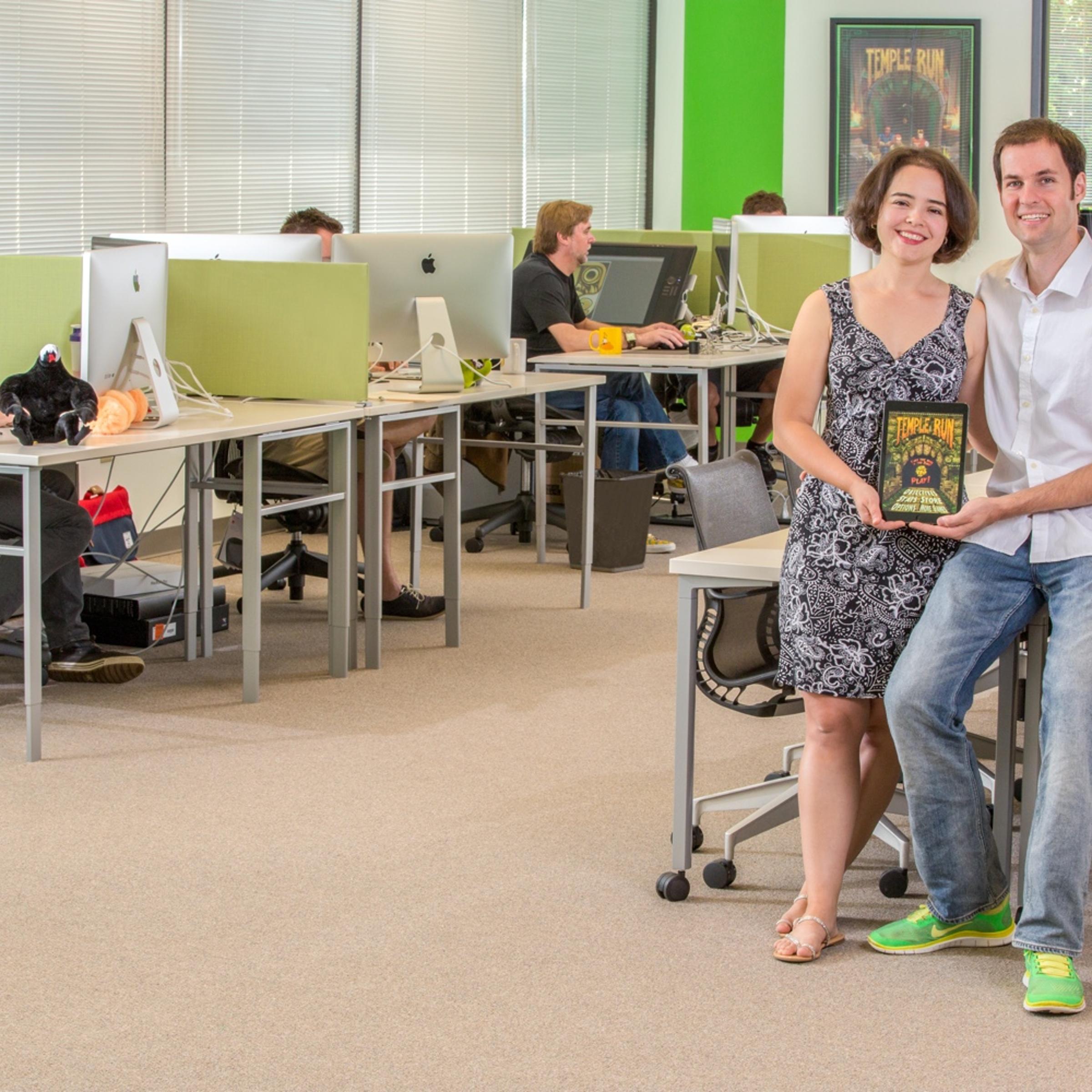 Imangi Studios co-founders Keith Shepherd and Natalia Luckyanova pose in a company photo.