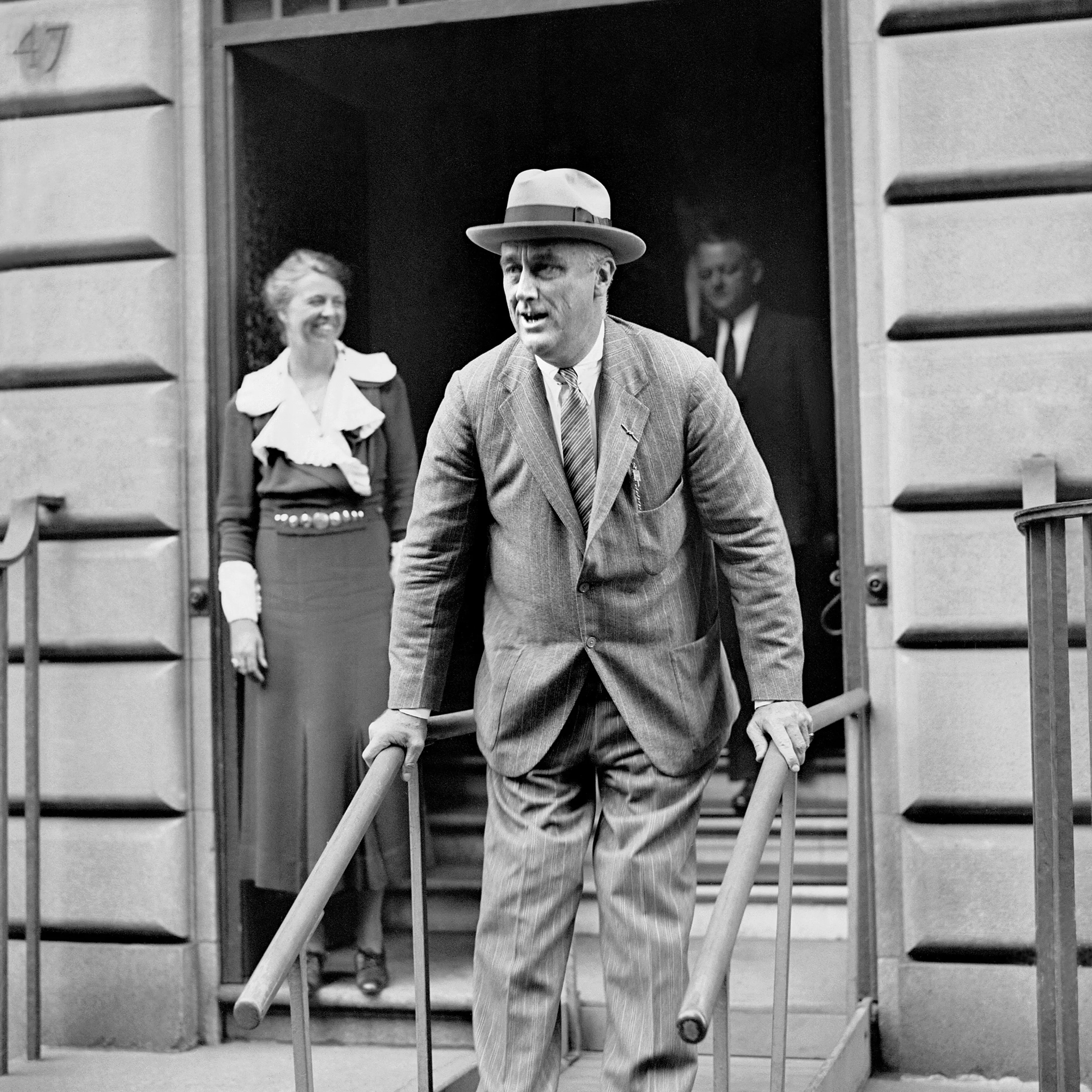 President Franklin D. Roosevelt leaves his home at 49 East 65th Street for a short visit to his family estate at Hyde Park, north of New York City on Sept. 27, 1933.
