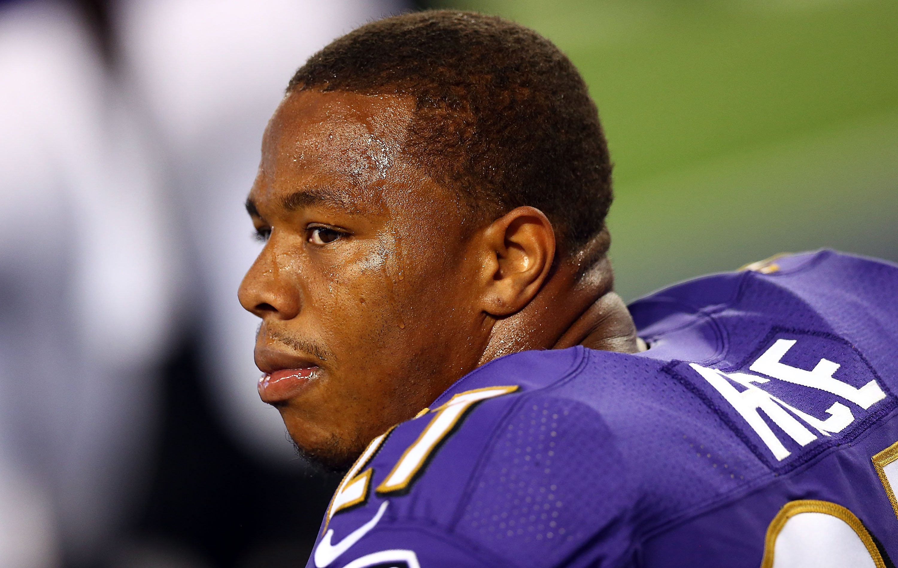 Ray Rice #27 of the Baltimore Ravens sits on the bench against the Dallas Cowboys in the first half of their preseason game at AT&T Stadium on Aug. 16, 2014 in Arlington, Texas.