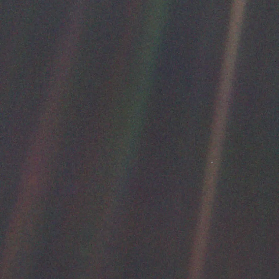 Pale Blue Dot color image of the Earth from Voyager 1.