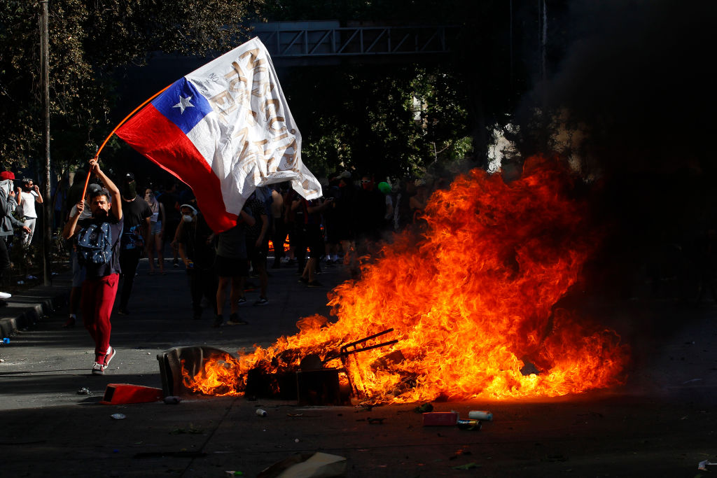 Protests Continue In Chile After President Piñera Declared State of Emergency And Suspended Subway Fare Hike