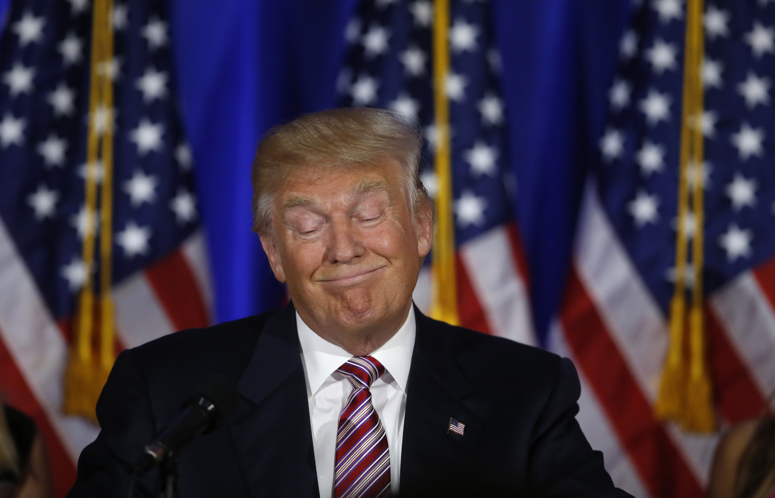 Republican U.S. presidential candidate Donald Trump pasues as he speaks at a campaign event on the day several states held presidential primaries, including California, at the Trump National Golf Club Westchester in Briarcliff Manor, New York, U.S., June
