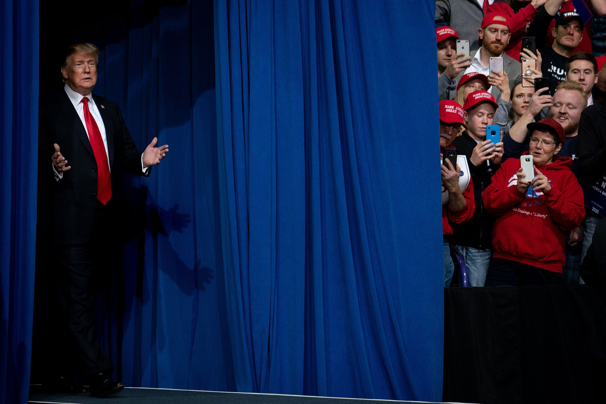 President Donald Trump arrives to speak at a rally at the Resch Center in Green Bay, Wis.