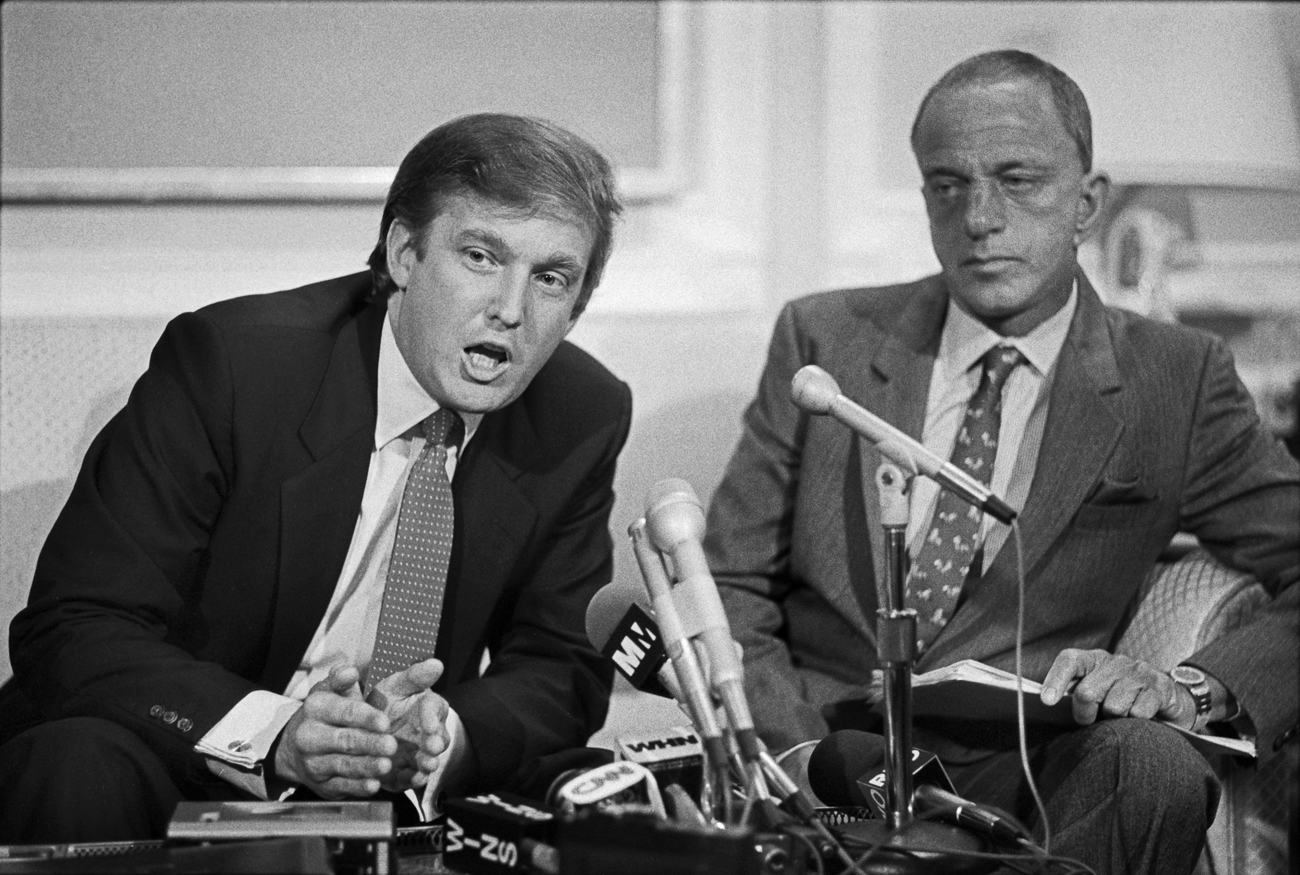 A news conference by Donald Trump and attorney Roy Cohn where they announced a billion dollar lawsuit against the National Football League, held at the offices of Saxe, Bacon and Bolan in New York on October 18, 1984.