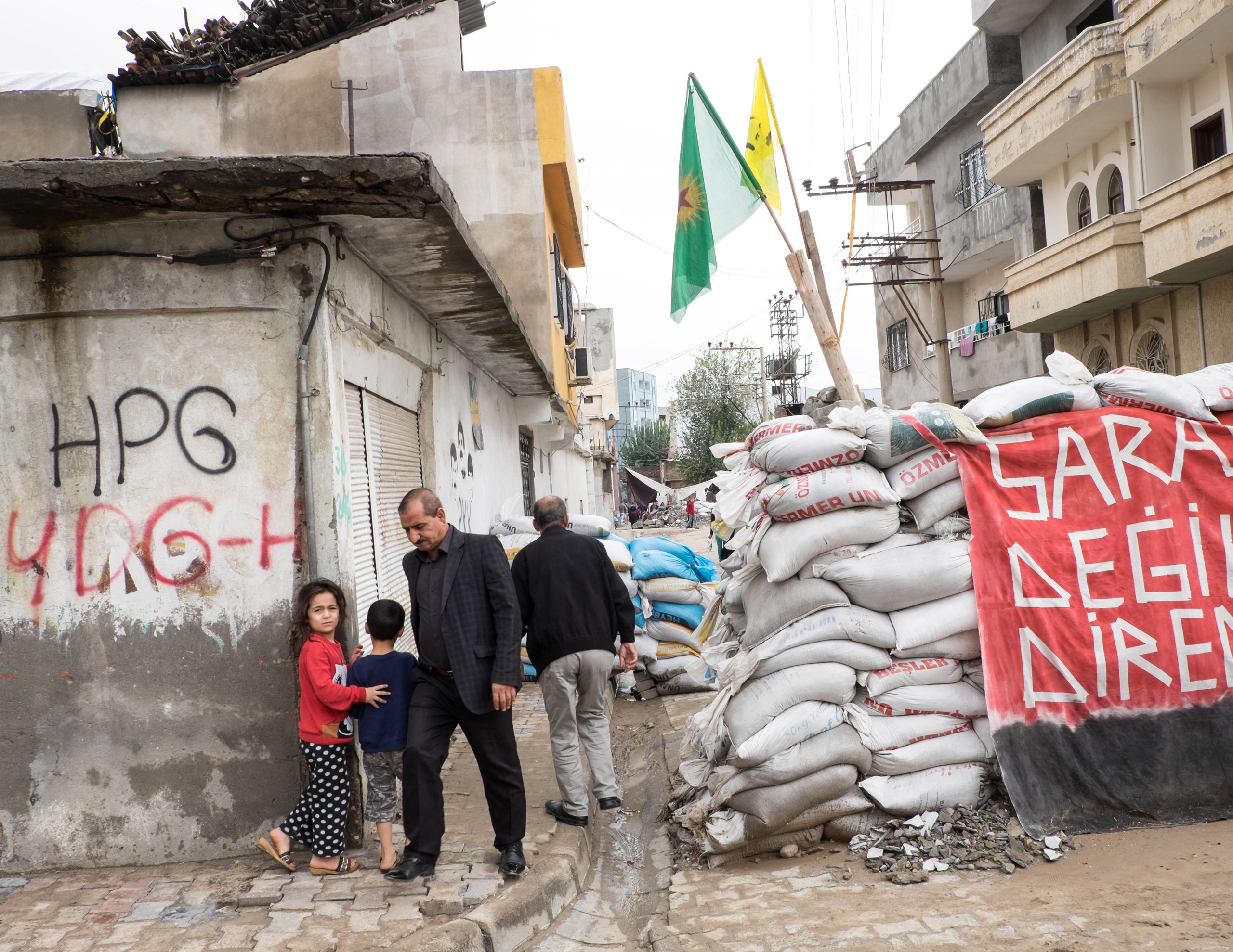 CIZRE, TURKEY - OCTOBER 29, 2015: Barricades in Cudi, an autonomous neighborhood in Cizre. Since July several neighborhoods in Cizre declared autonomy and groups of young Kurds have taken up arms and raise barricades to prevent the advances of the Turkis