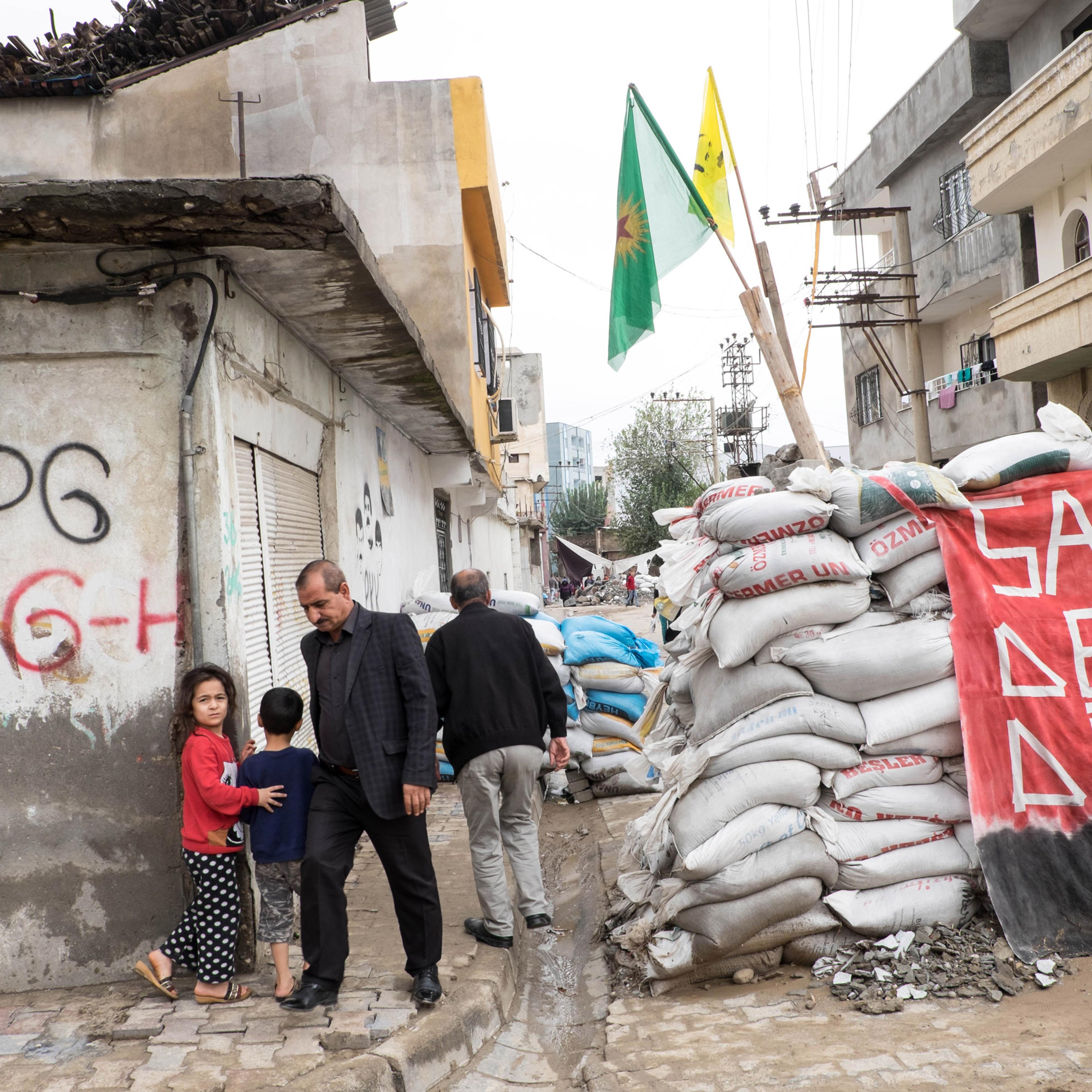 CIZRE, TURKEY - OCTOBER 29, 2015: Barricades in Cudi, an autonomous neighborhood in Cizre. Since July several neighborhoods in Cizre declared autonomy and groups of young Kurds have taken up arms and raise barricades to prevent the advances of the Turkis
