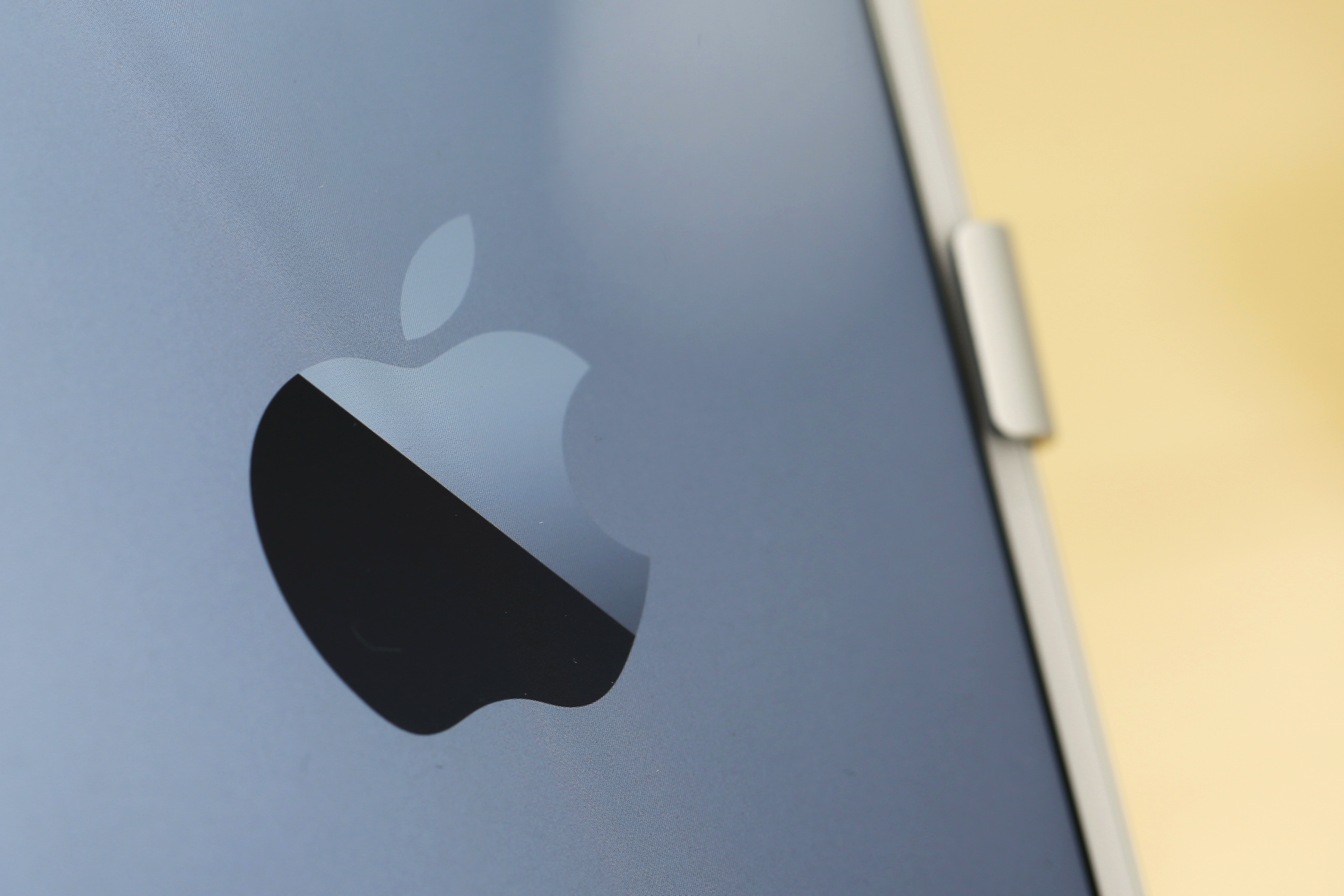 An Apple Inc. logo is displayed on the company's iPhone 6 Plus during the sales launch of the iPhone 6 and iPhone 6 Plus on Sept. 19, 2014.