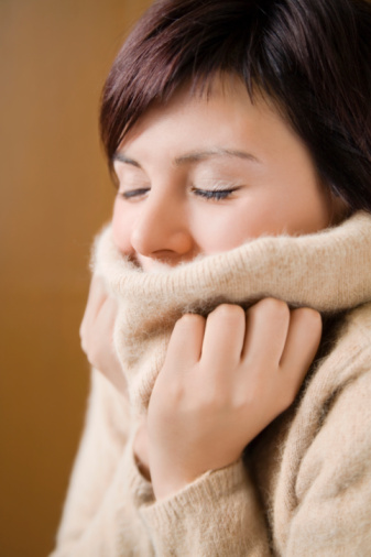 woman-turtleneck-shivering