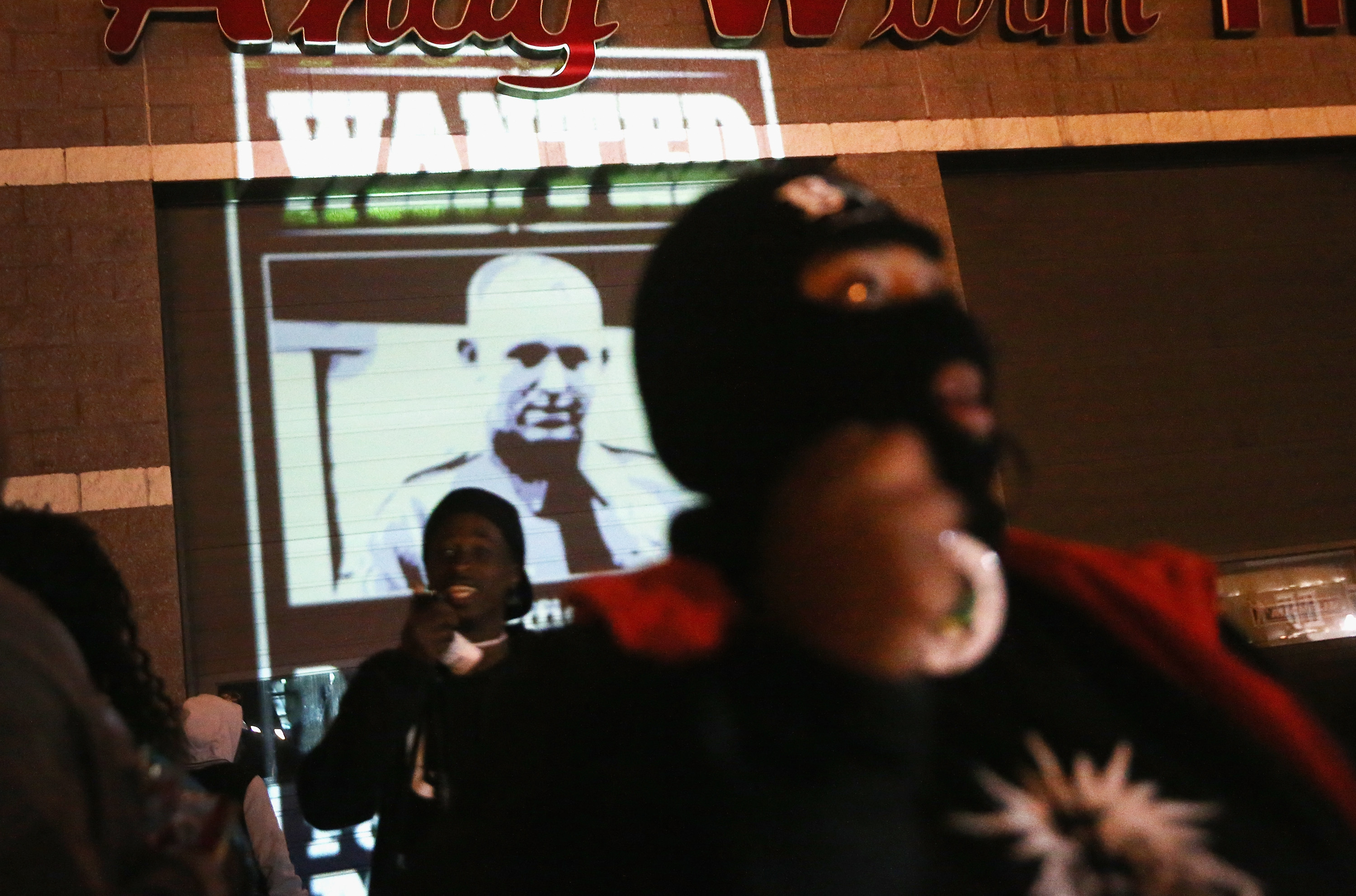 Activists March In Ferguson On Nat'l Day Of Action Against Police Brutality