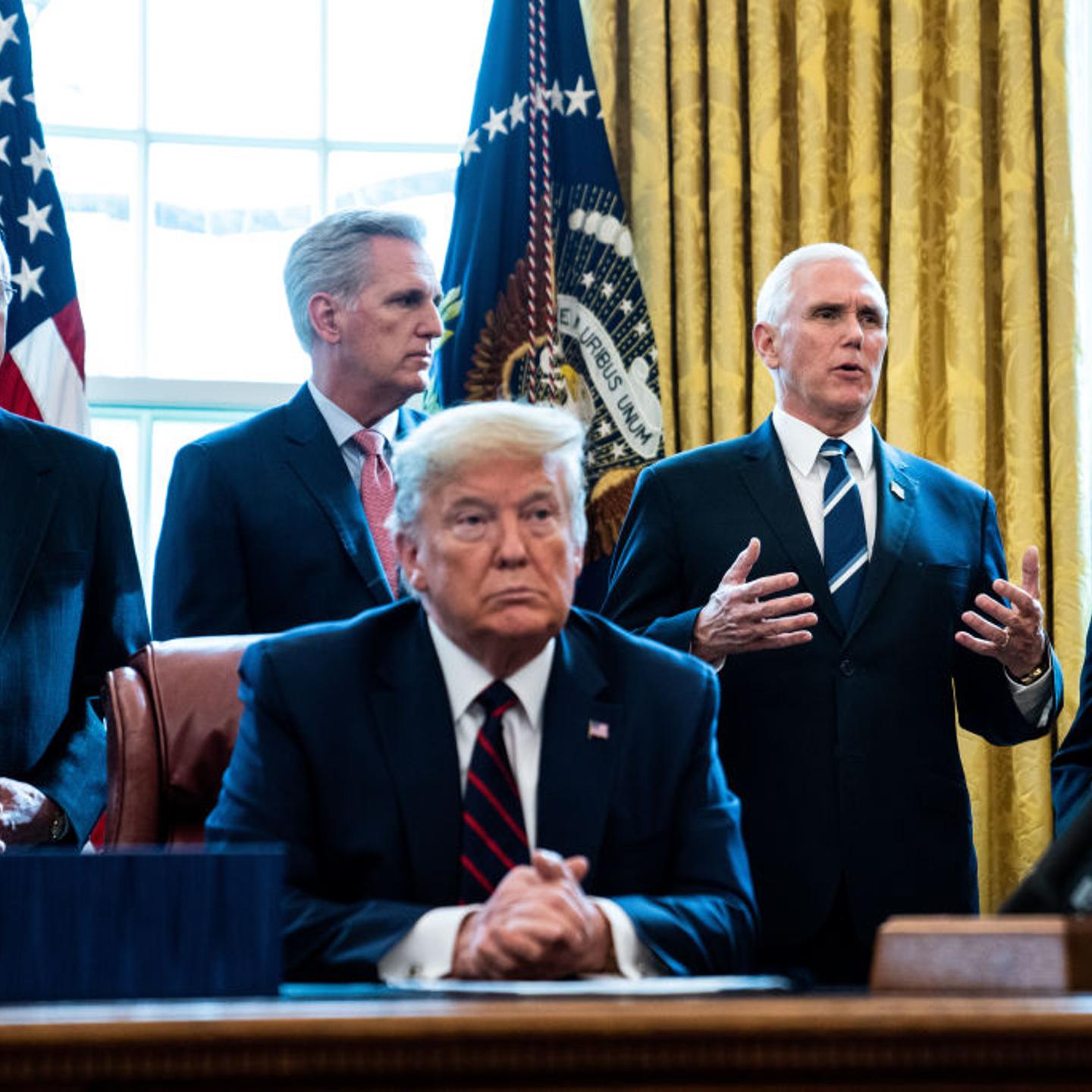 President Trump Signs Coronavirus Stimulus Bill In The Oval Office