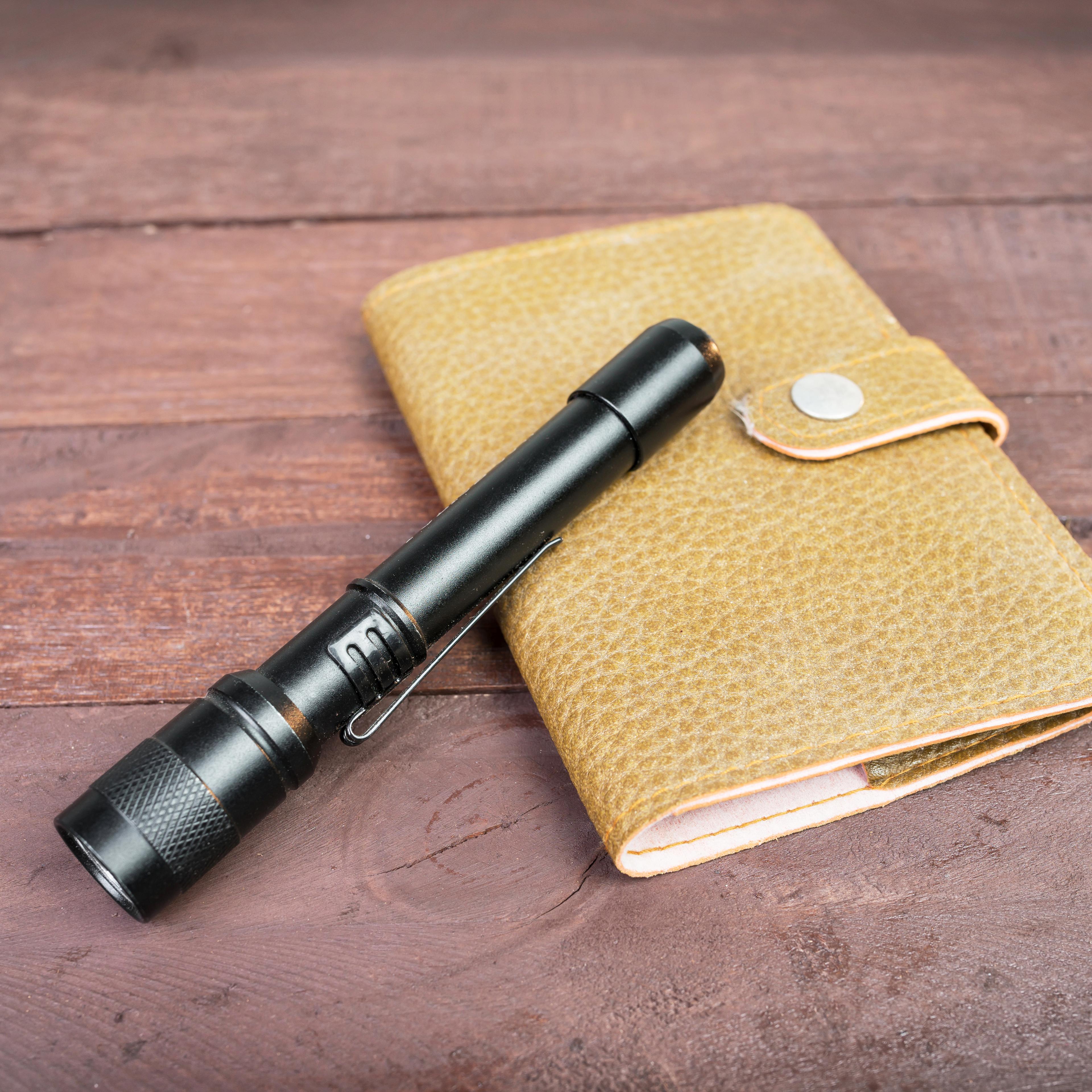 notebook-flashlight-table