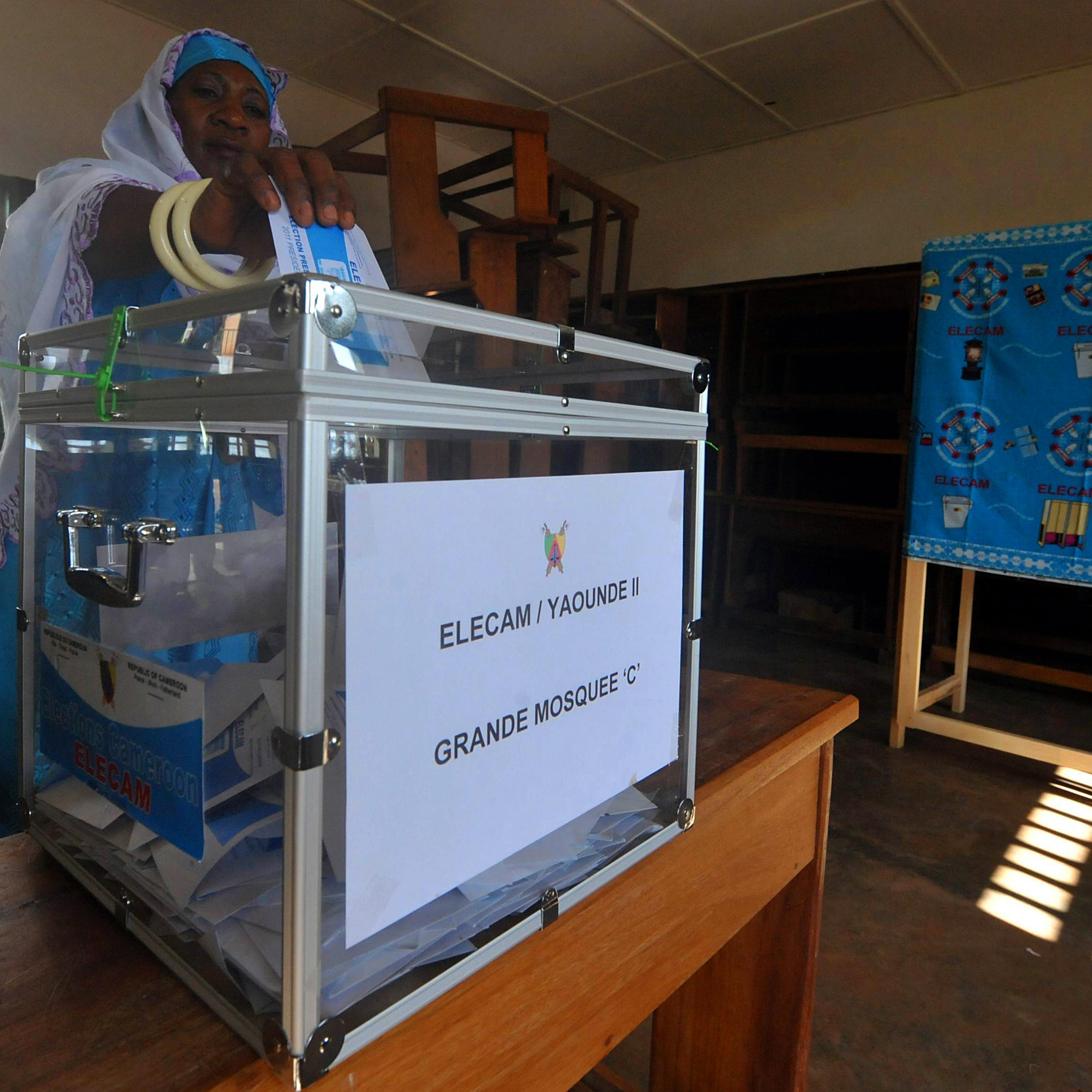 A Cameroonian casts her vote at a polling station in Yaoundé, Cameroon on Oct. 9, 2011.