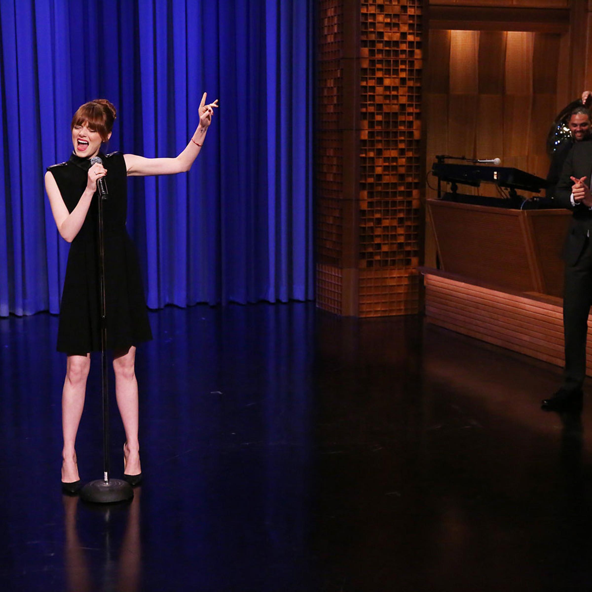 Actress Emma Stone and host Jimmy Fallon during a lip synch battle on April 28, 2014