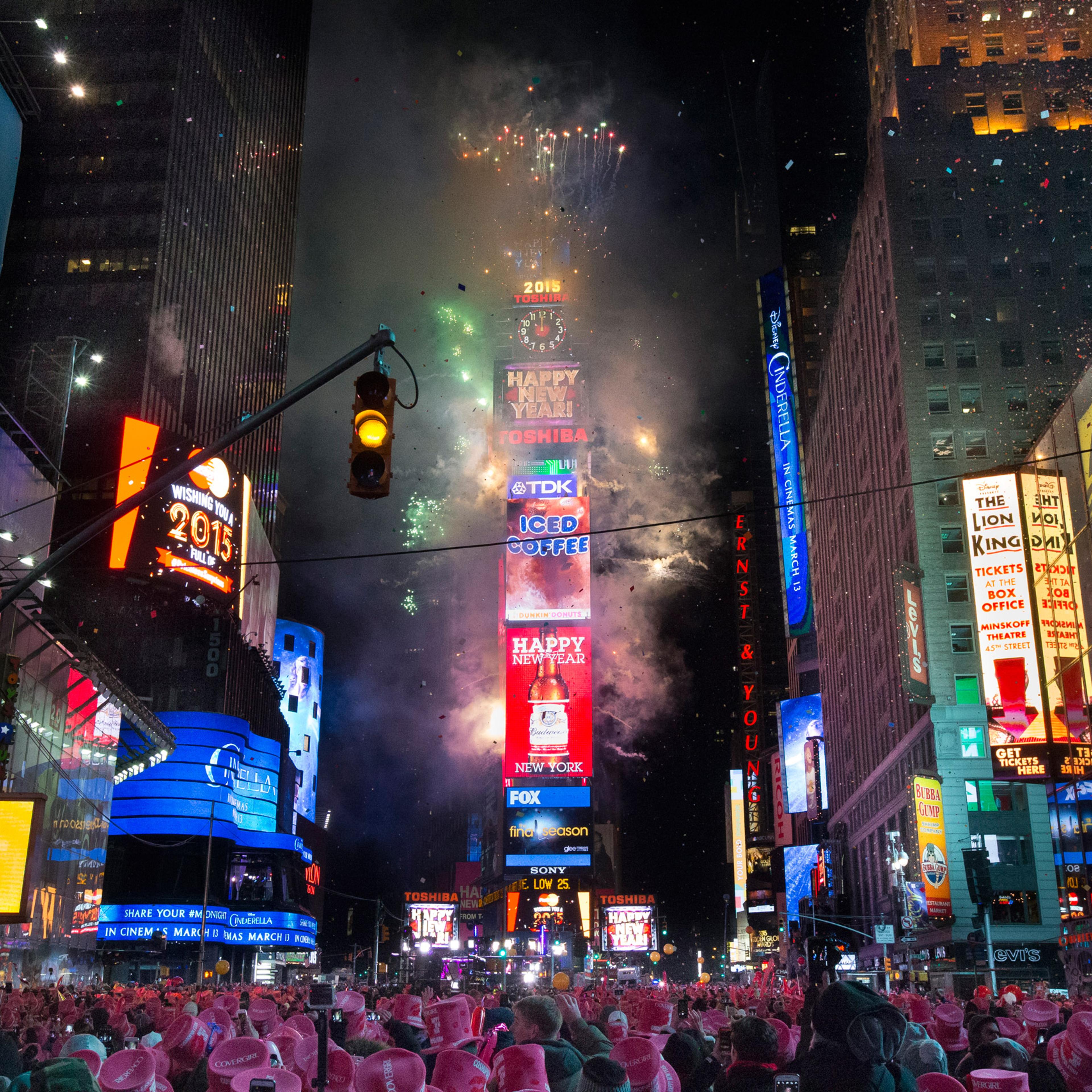 Fireworks erupt after midnight in Times Square during the New Year's Eve celebration, Thursday, Jan. 1, 2015, in New York. Thousands braved the cold to watch the annual ball drop and ring in the new year. (AP Photo/John Minchillo)