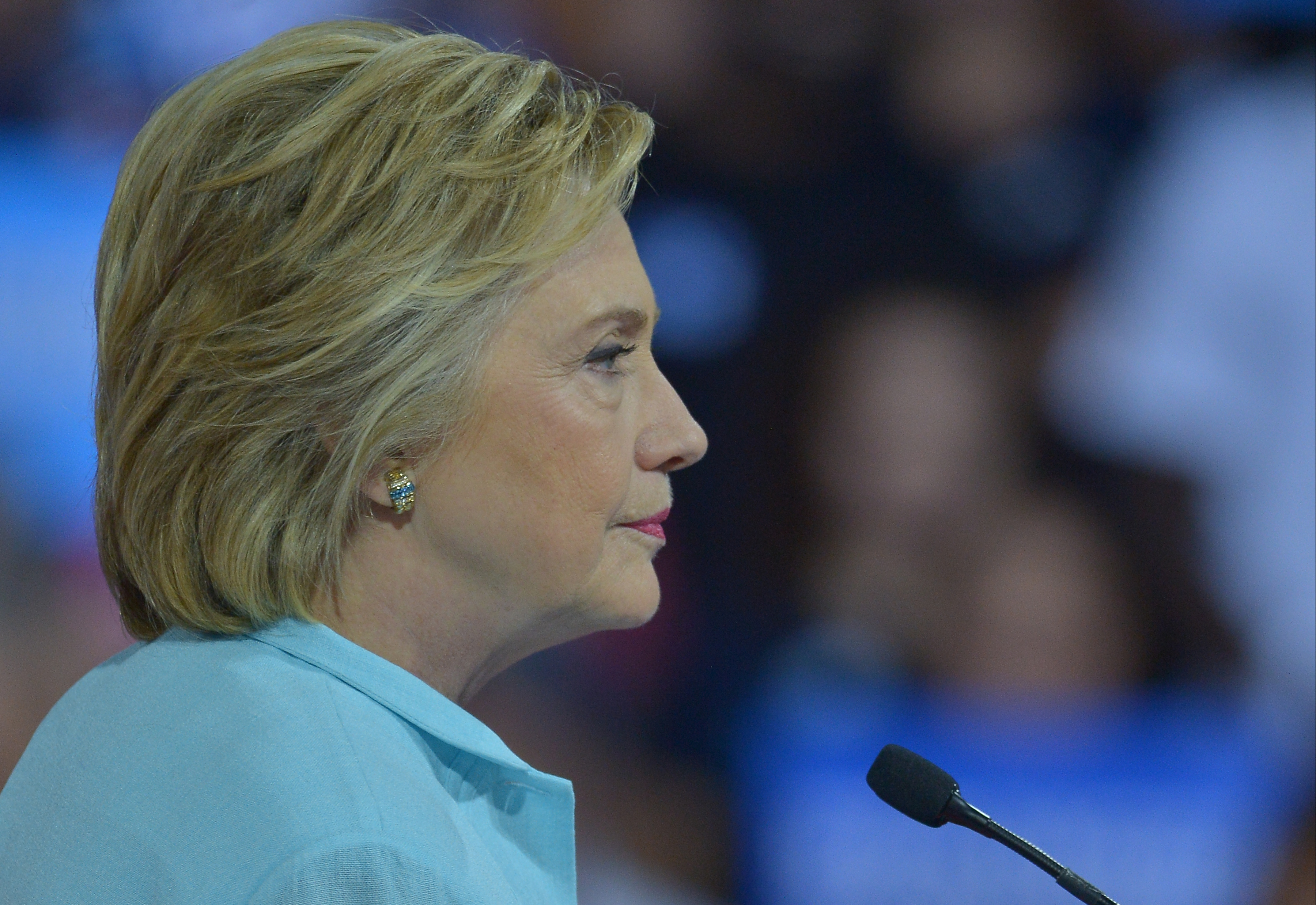 Democratic Presumptive Nominee for President former Secretary of State Hillary Clinton speaks with her Democratic candidate for Vice President, U.S. Senator Tim Kaine (D-VA) during a campaign rally with voters at the Florida International University Pant