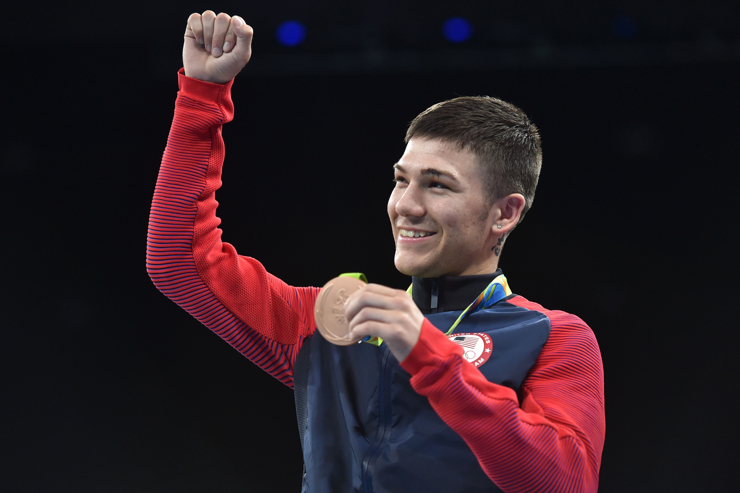 USA's Nico Miguel Hernandez poses with his medal after winning in the boxing matches in the Rio Olympics at the Rio 2016 Olympic Games in Rio de Janeiro on August 14, 2016. Hasanboy Dusmatov won Uzbekistan's first gold medal of the Rio Olympics when he b