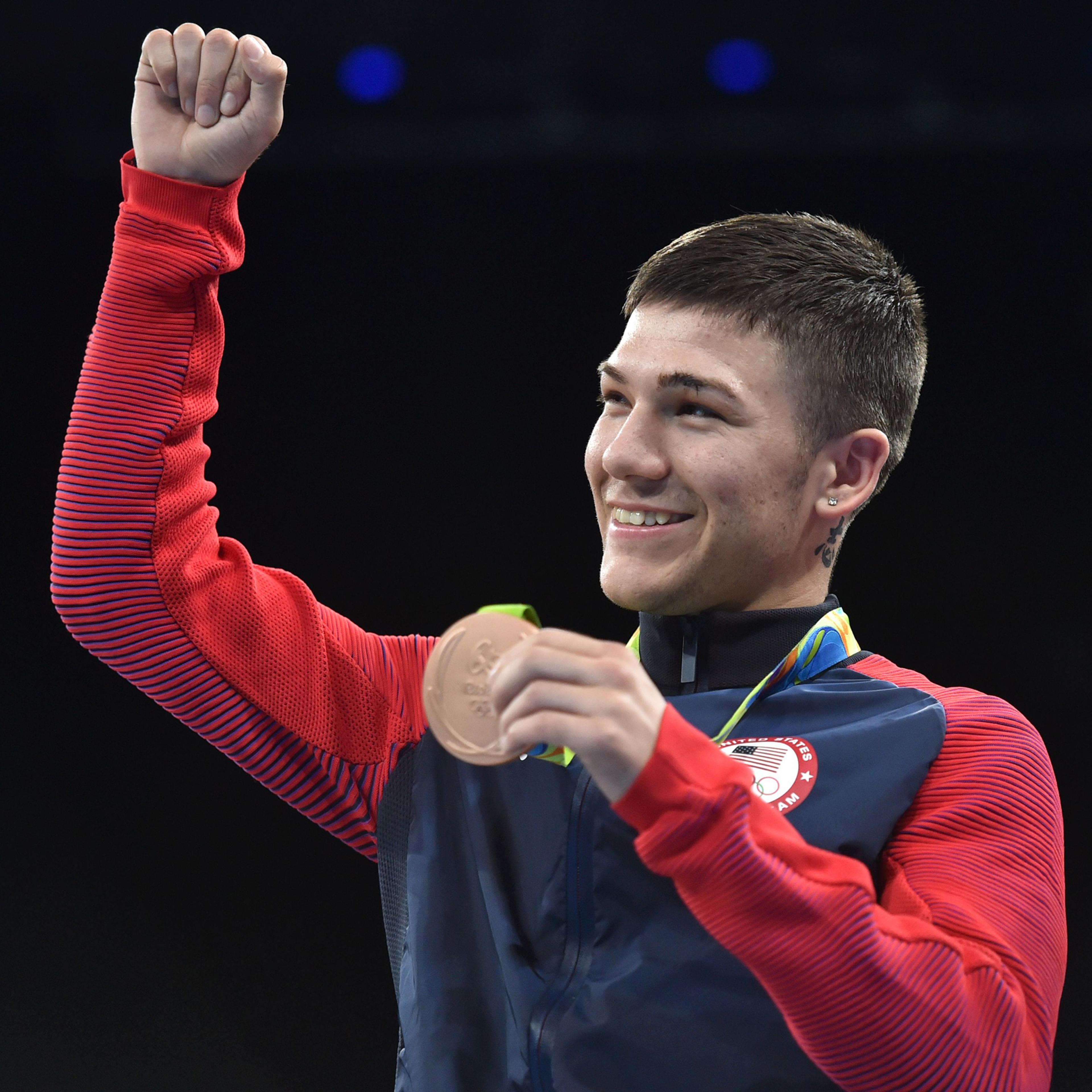 USA's Nico Miguel Hernandez poses with his medal after winning in the boxing matches in the Rio Olympics at the Rio 2016 Olympic Games in Rio de Janeiro on August 14, 2016. Hasanboy Dusmatov won Uzbekistan's first gold medal of the Rio Olympics when he b